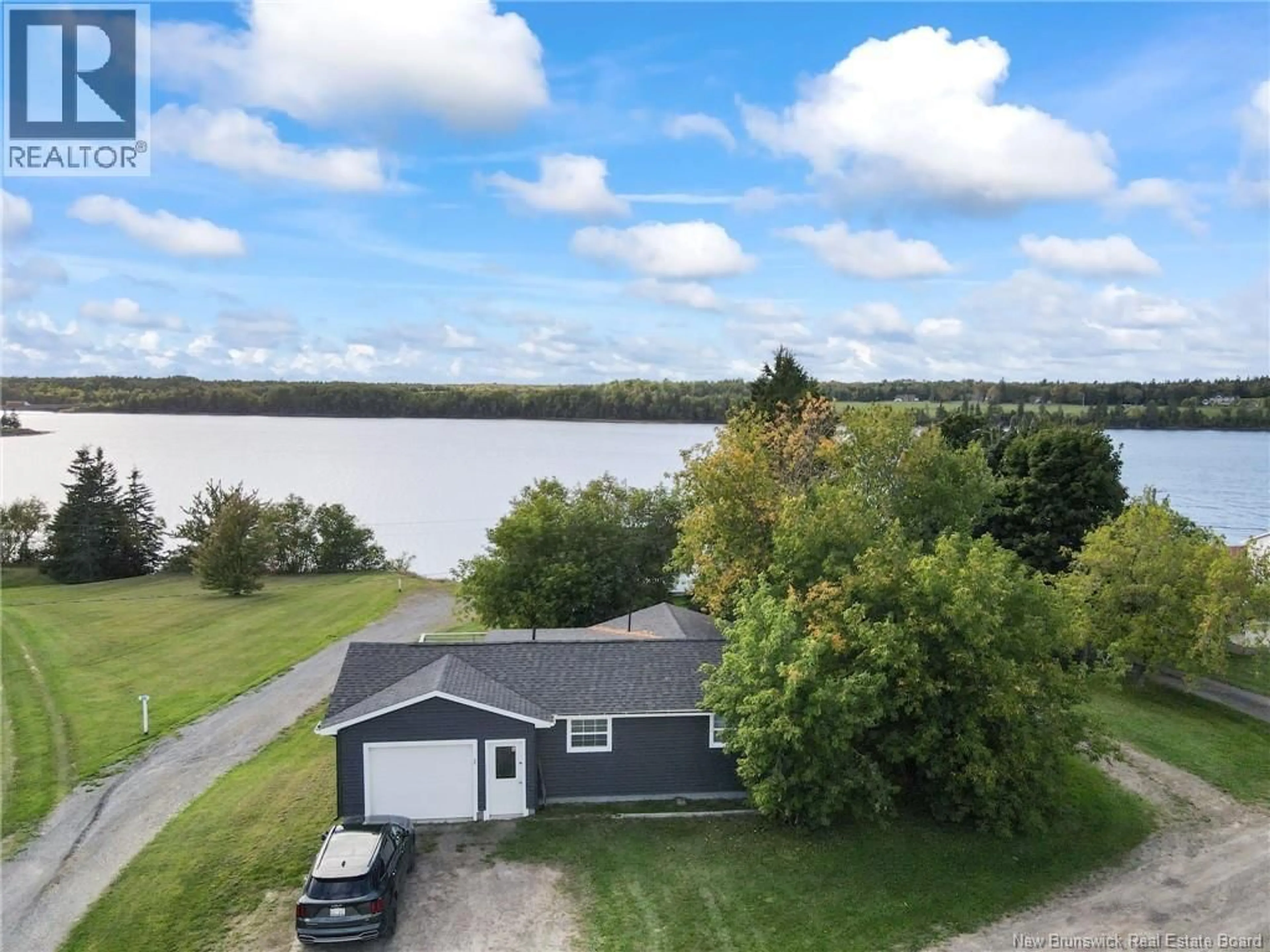 A pic from outside/outdoor area/front of a property/back of a property/a pic from drone, water/lake/river/ocean view for 35 LIONEL STREET, Bouctouche New Brunswick E4S5L7