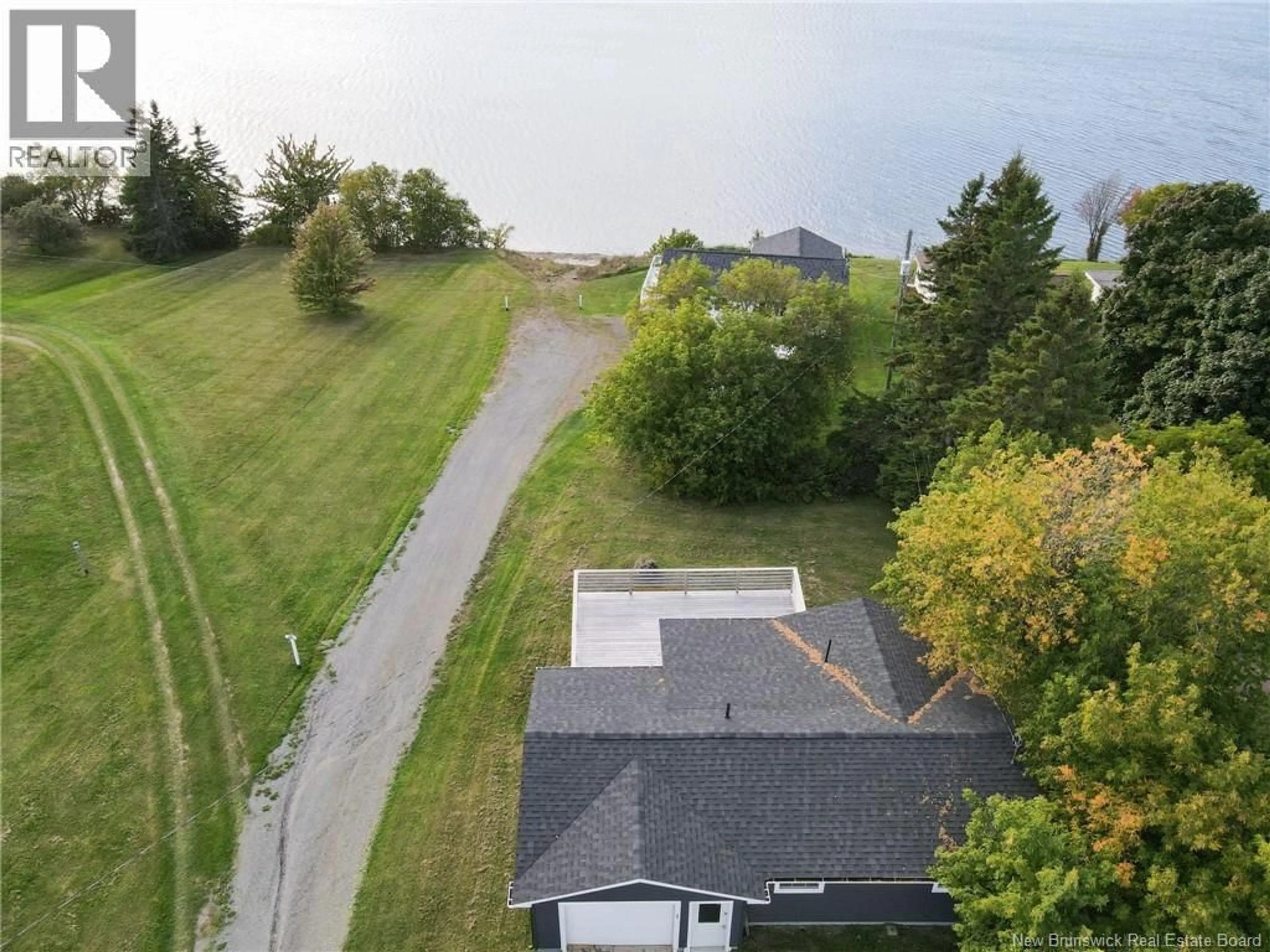 A pic from outside/outdoor area/front of a property/back of a property/a pic from drone, water/lake/river/ocean view for 35 LIONEL STREET, Bouctouche New Brunswick E4S5L7