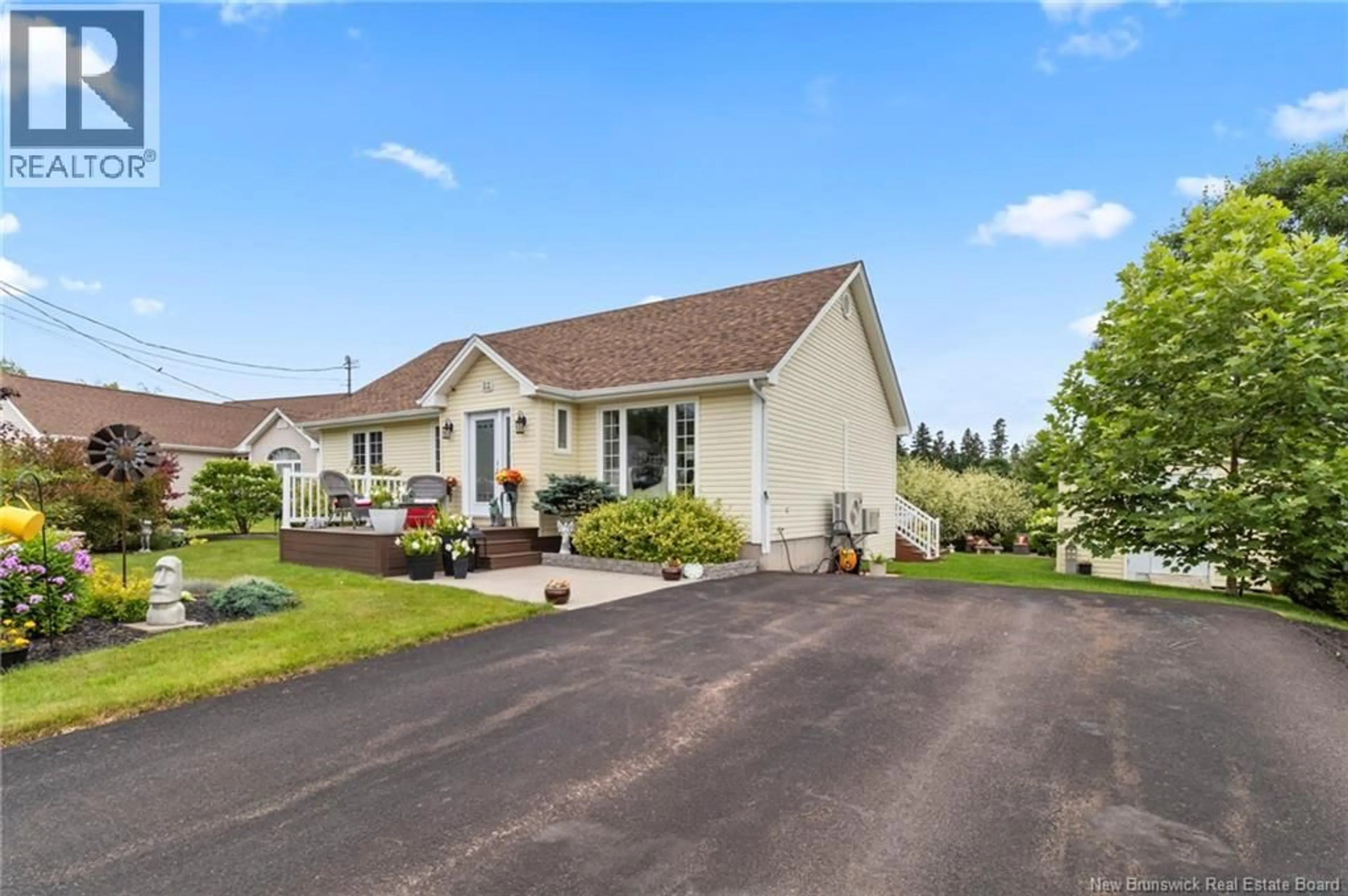 Home with vinyl exterior material, street for 22 CAP PELE COURT, Dieppe New Brunswick E1A6Z2