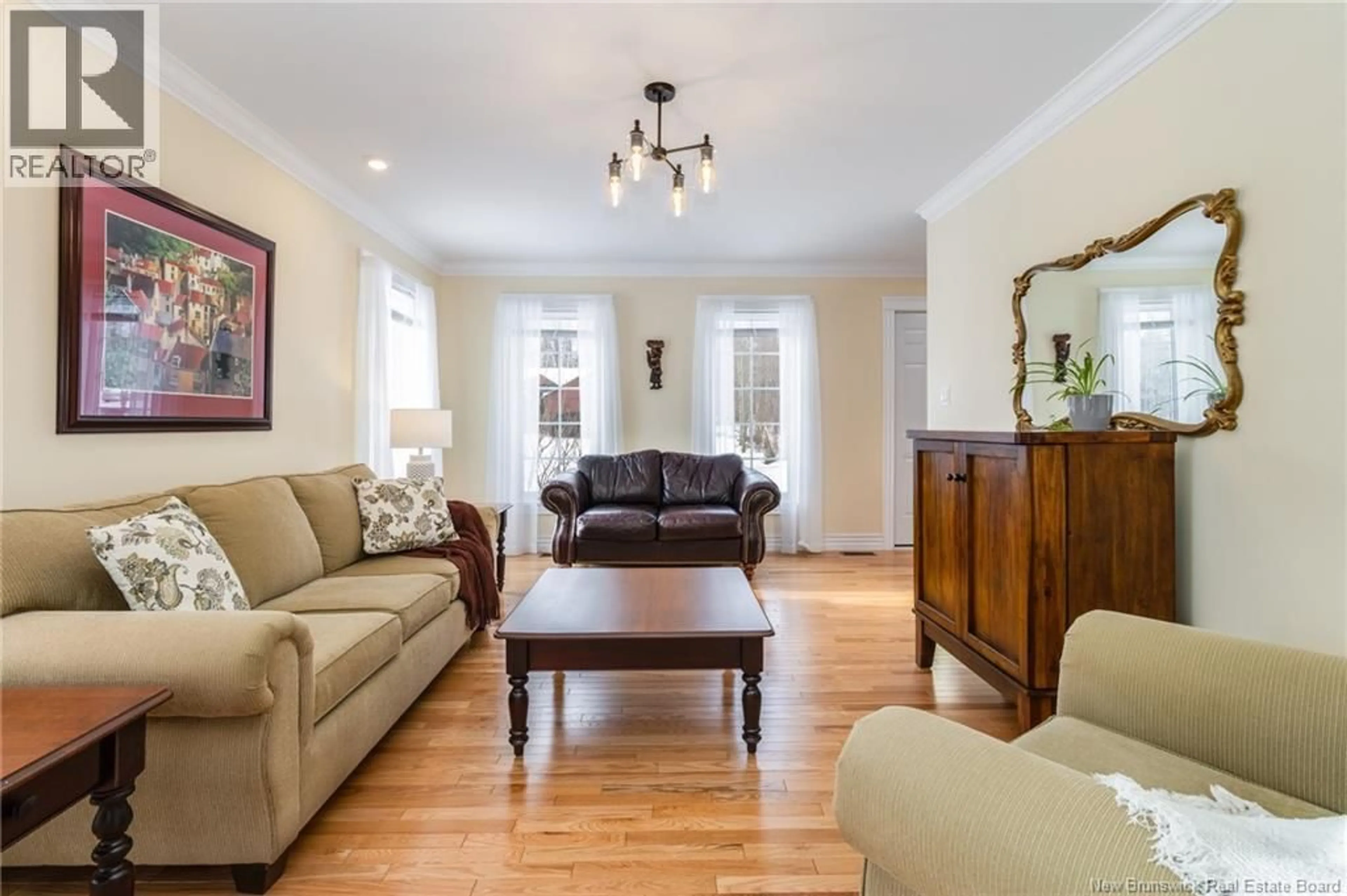 Living room with furniture, wood/laminate floor for 36 ROBBY STREET, Douglas New Brunswick E3G8B4