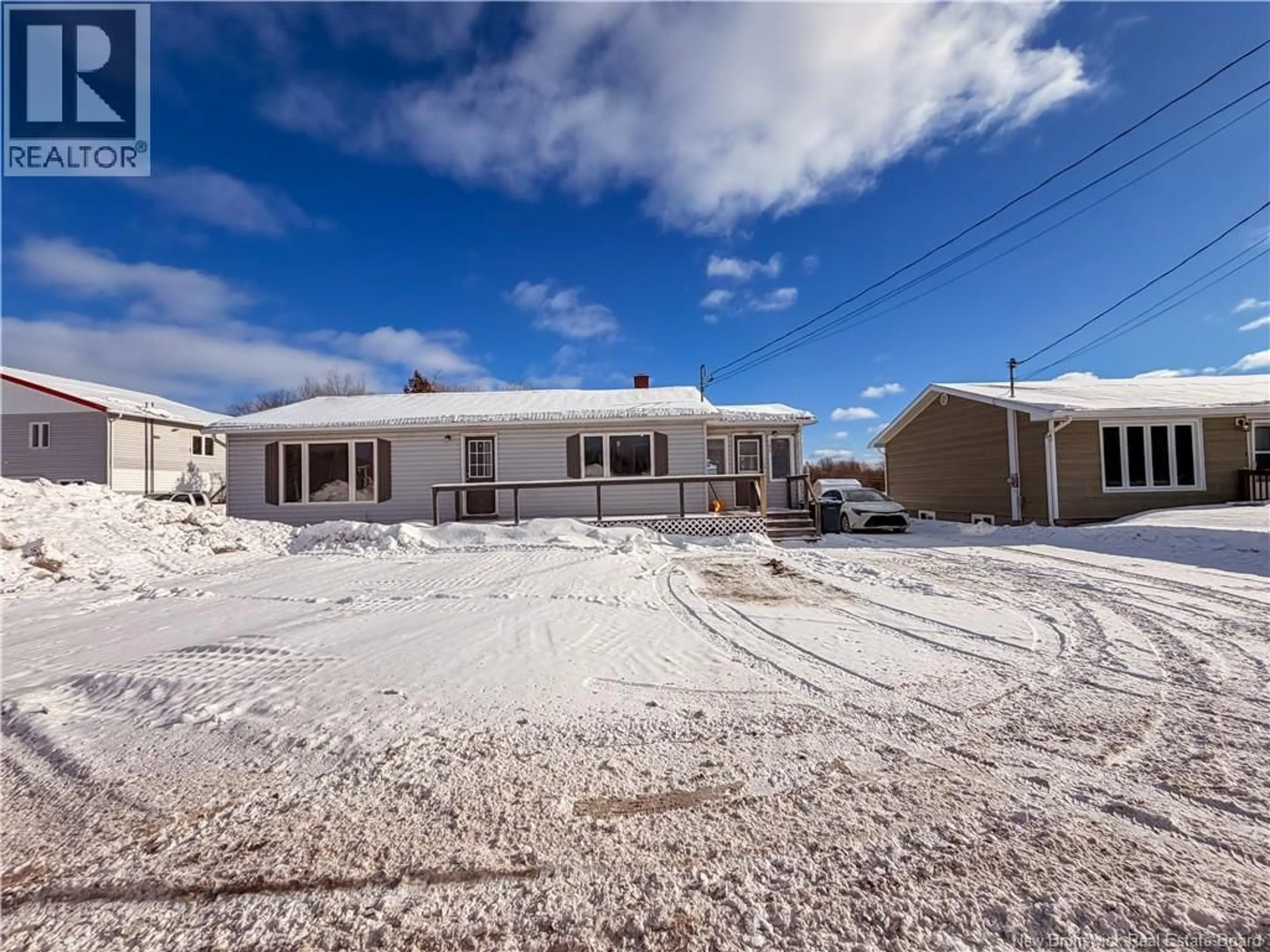 A pic from outside/outdoor area/front of a property/back of a property/a pic from drone, street for 133 RUE PRINCIPALE, Eel River Crossing New Brunswick E8E1S2