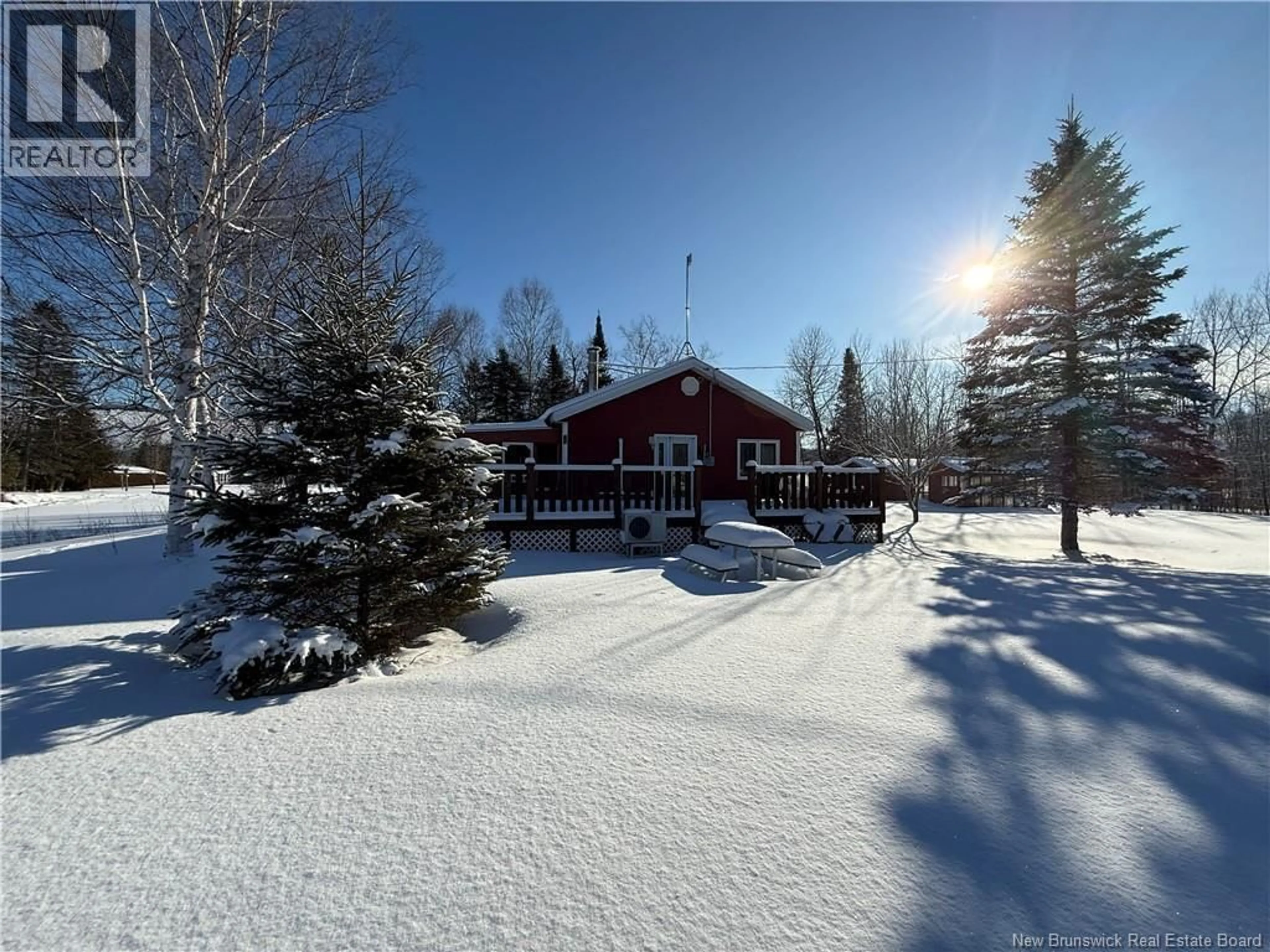 A pic from outside/outdoor area/front of a property/back of a property/a pic from drone, unknown for 26 CARON LANE, New Denmark New Brunswick E7G1K4