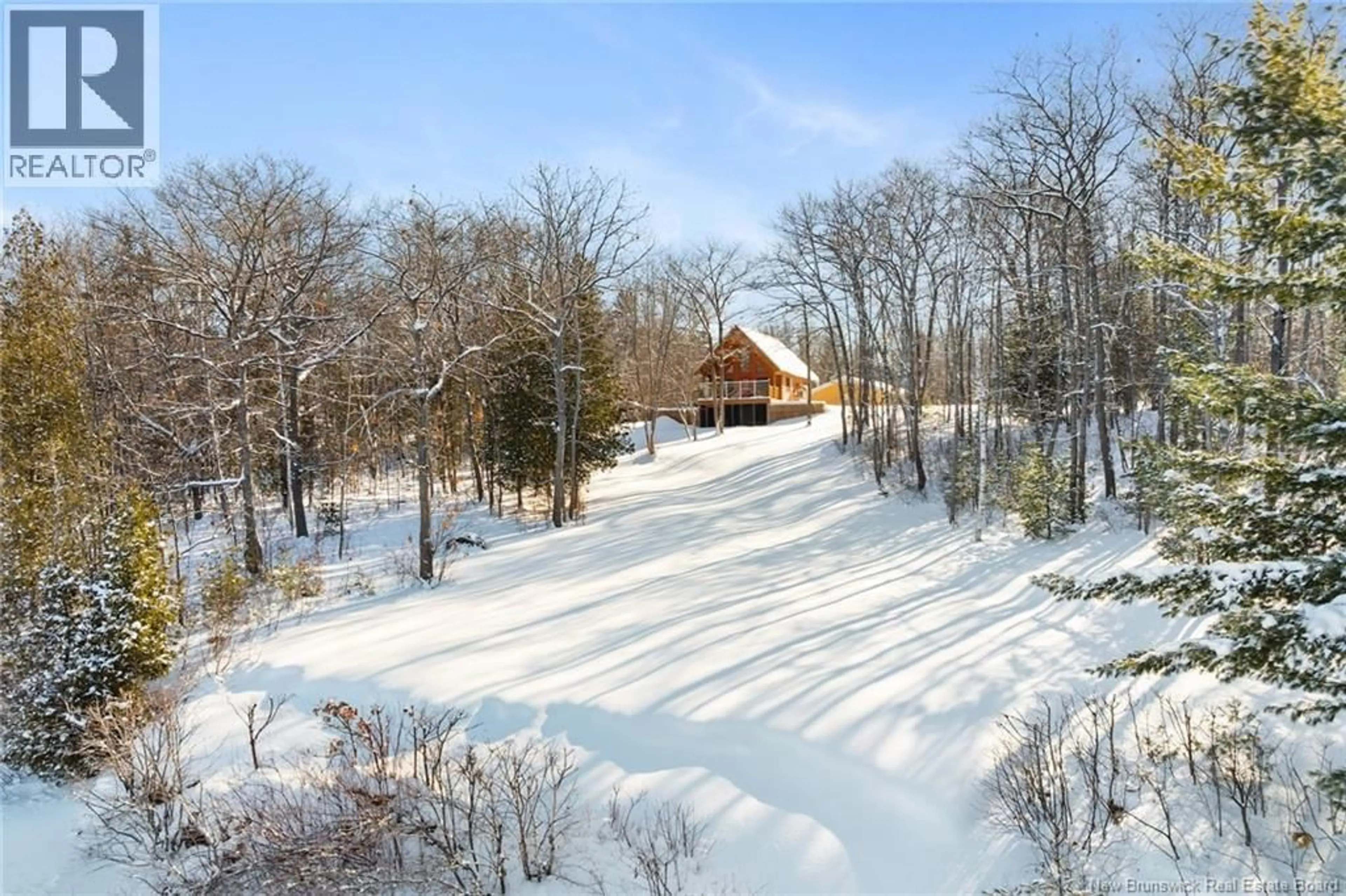 A pic from outside/outdoor area/front of a property/back of a property/a pic from drone, unknown for 602 COX POINT ROAD, Cumberland Bay New Brunswick E4A2W9