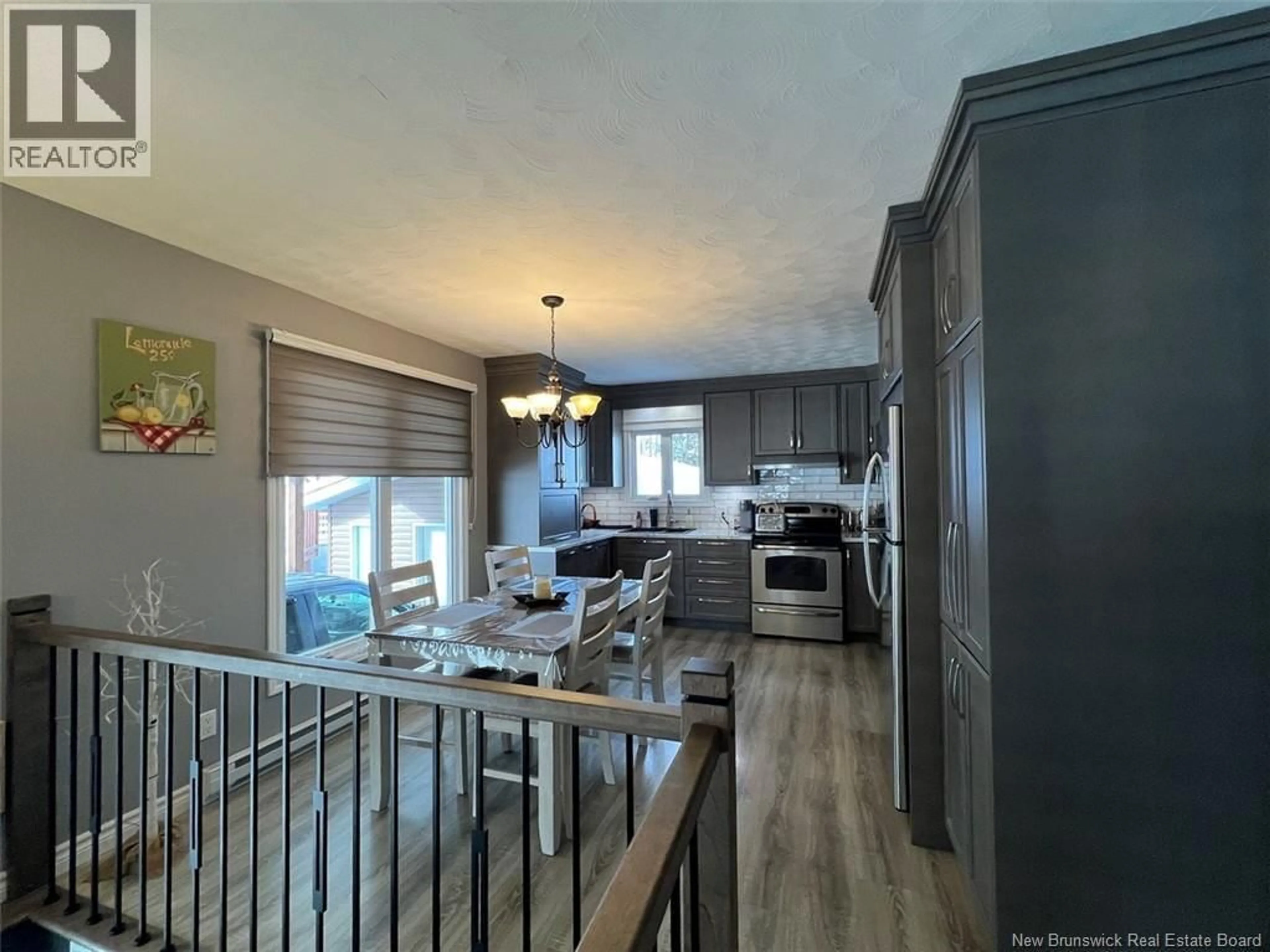 Open concept kitchen, wood/laminate floor for 8 EDGAR STREET, Saint-Basile New Brunswick E7C1N8
