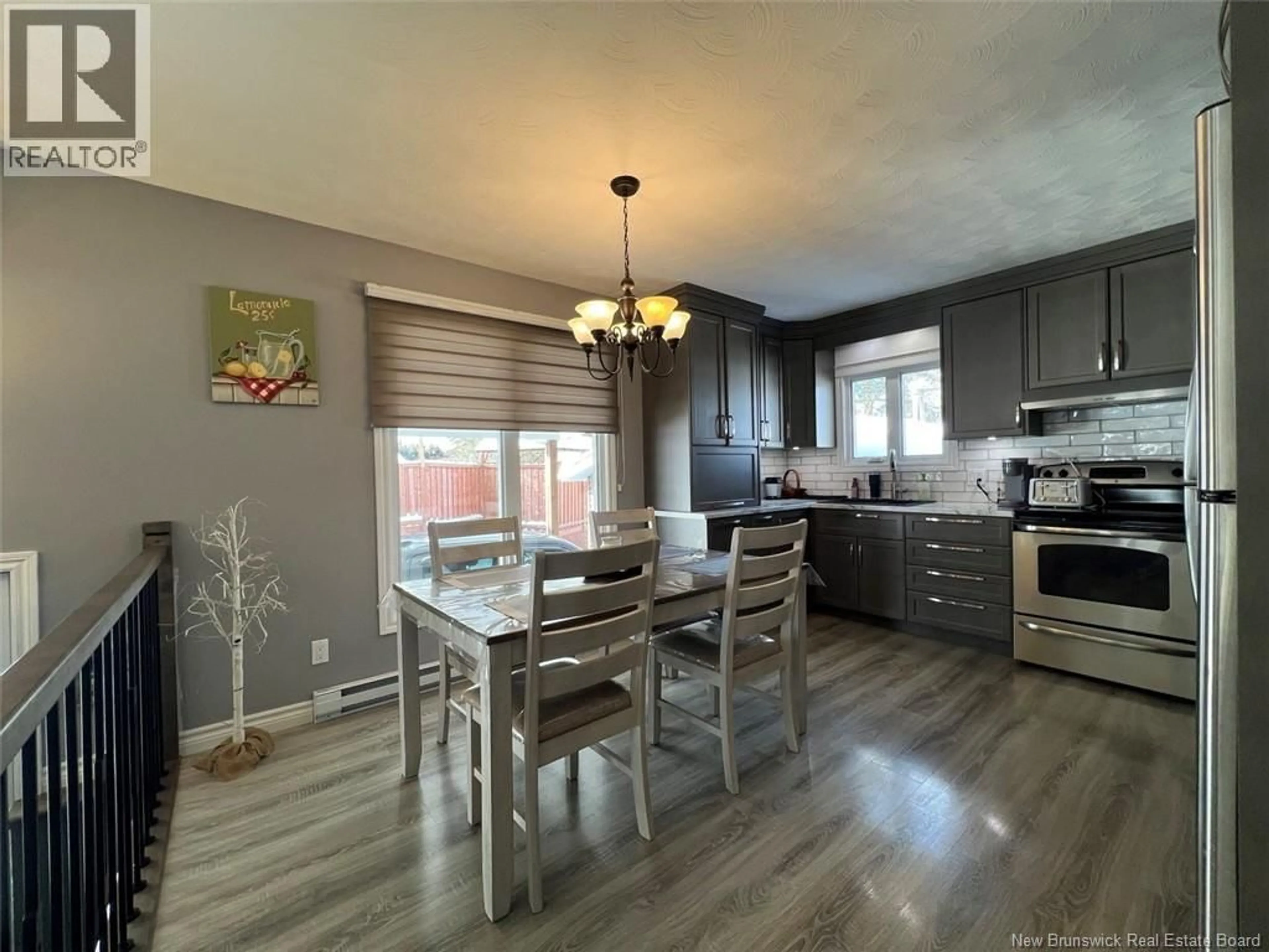 Open concept kitchen, wood/laminate floor for 8 EDGAR STREET, Saint-Basile New Brunswick E7C1N8