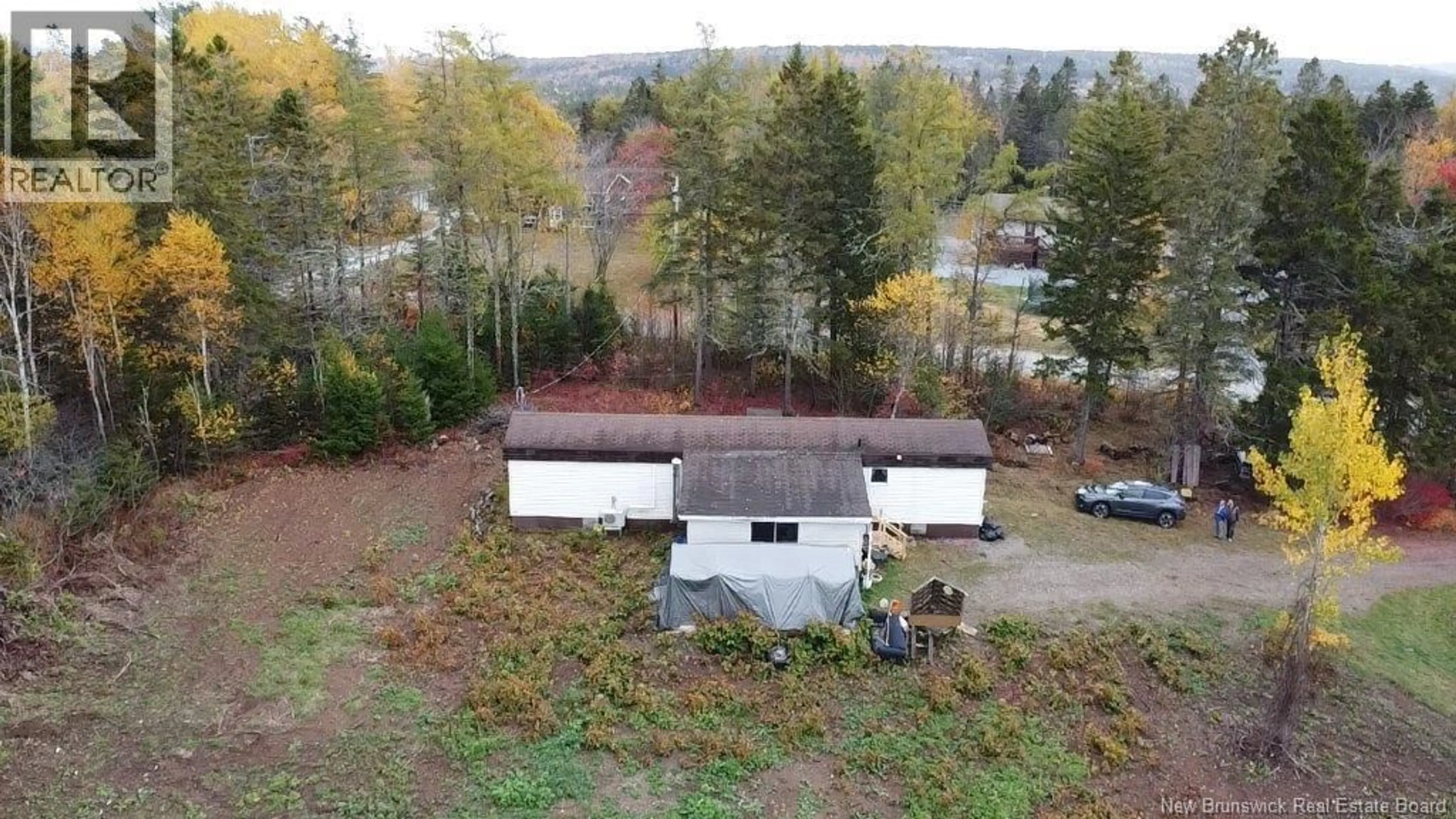 A pic from outside/outdoor area/front of a property/back of a property/a pic from drone, forest/trees view for 74 PIPERTOWN ROAD, Summerville New Brunswick E5S1E5