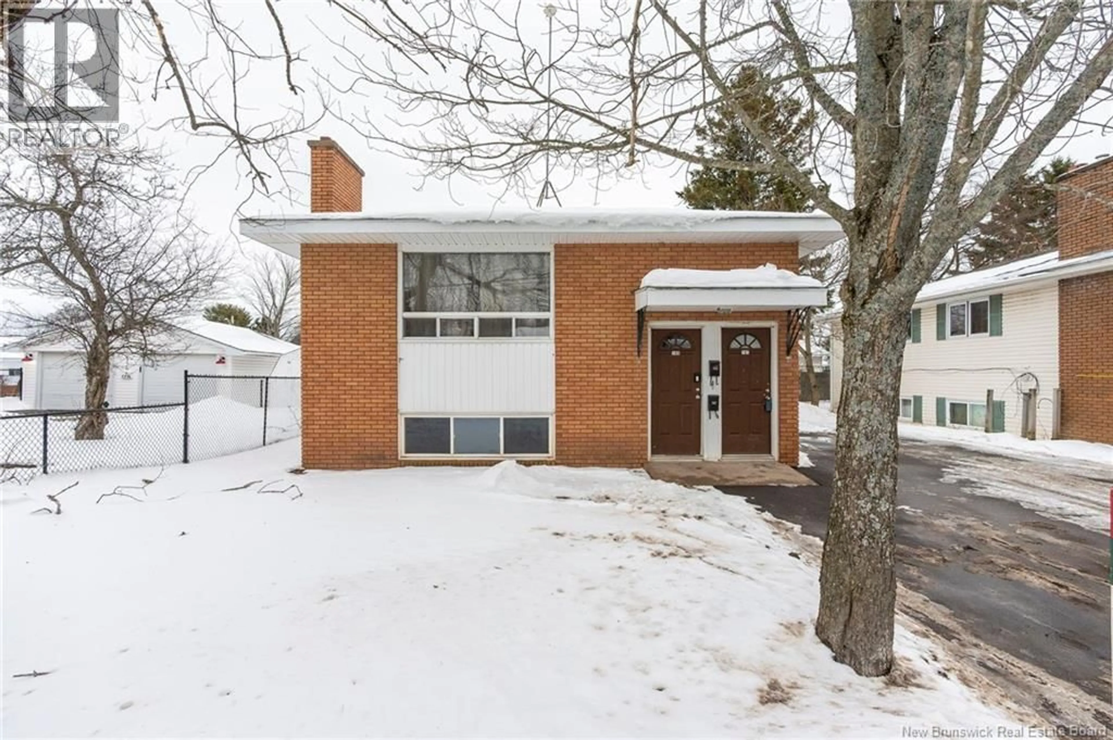Home with brick exterior material, street for 167-169 SNOW AVENUE, Moncton New Brunswick E1C8B3
