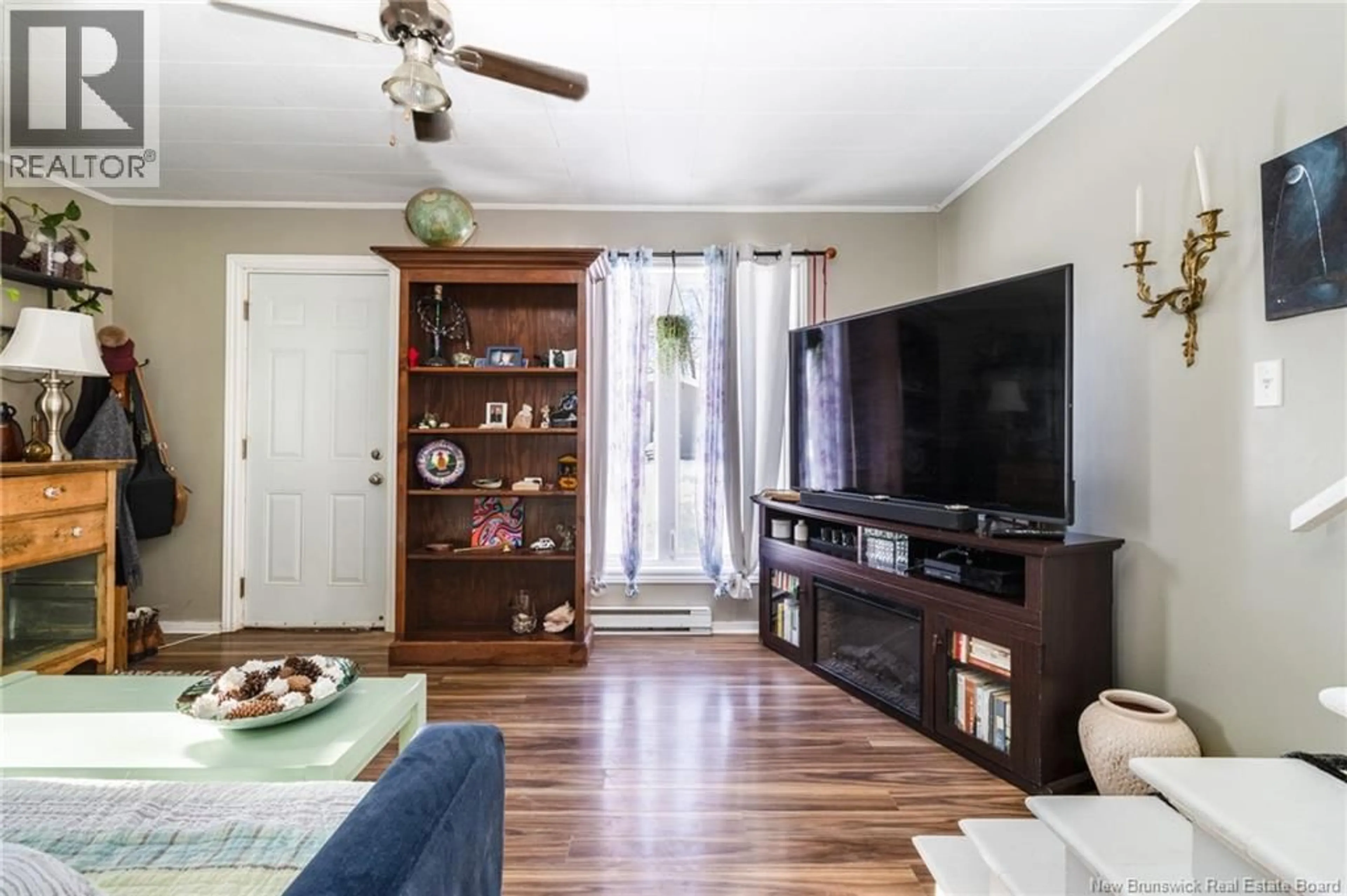 Living room with furniture, wood/laminate floor for A & B - 16 YOUNG STREET, Fredericton New Brunswick E3A3Y2