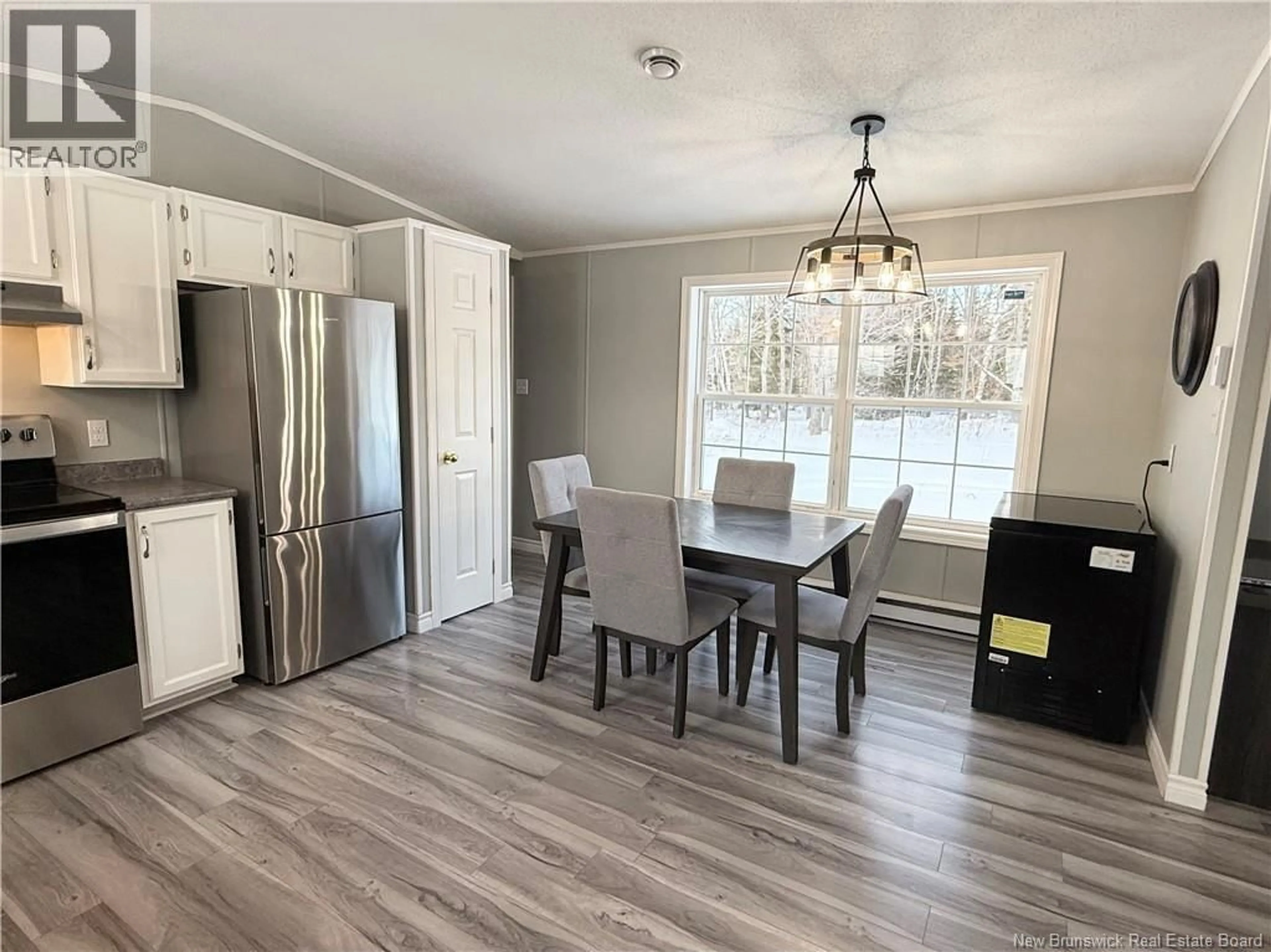 Open concept kitchen, wood/laminate floor for 711 ROUTE 450, Lavillette New Brunswick E9G2R1