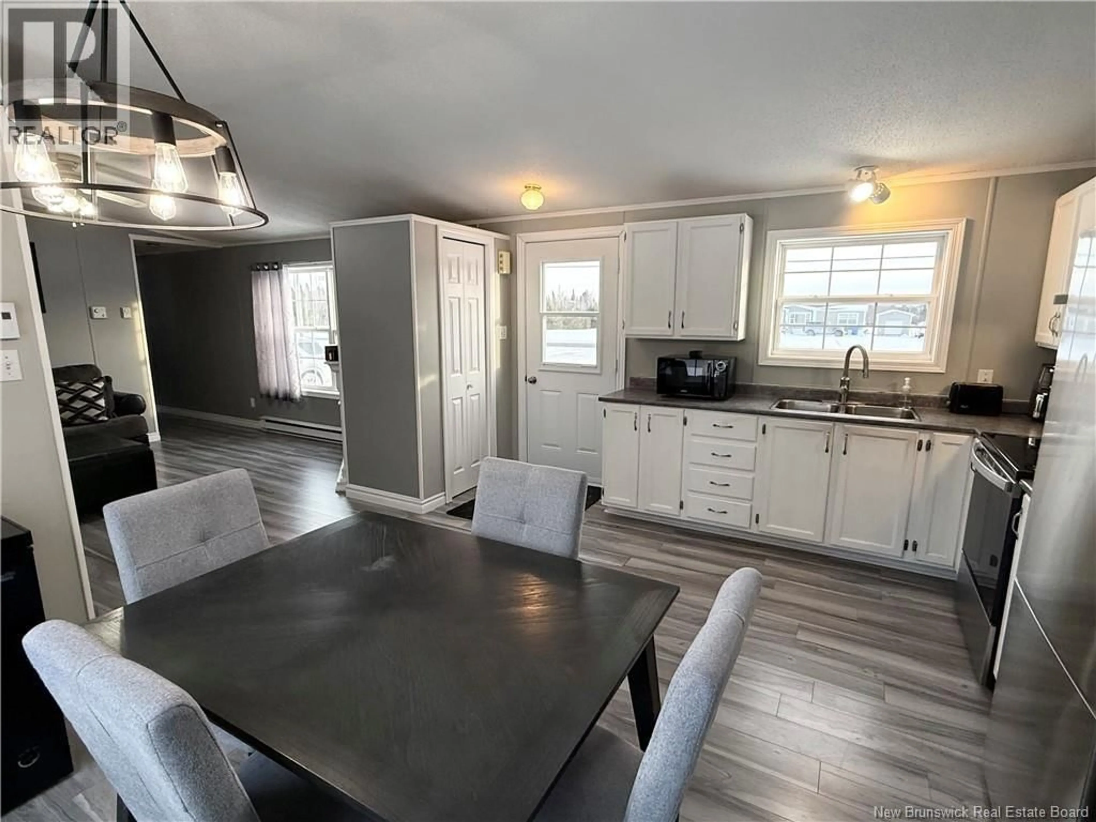 Open concept kitchen, wood/laminate floor for 711 ROUTE 450, Lavillette New Brunswick E9G2R1