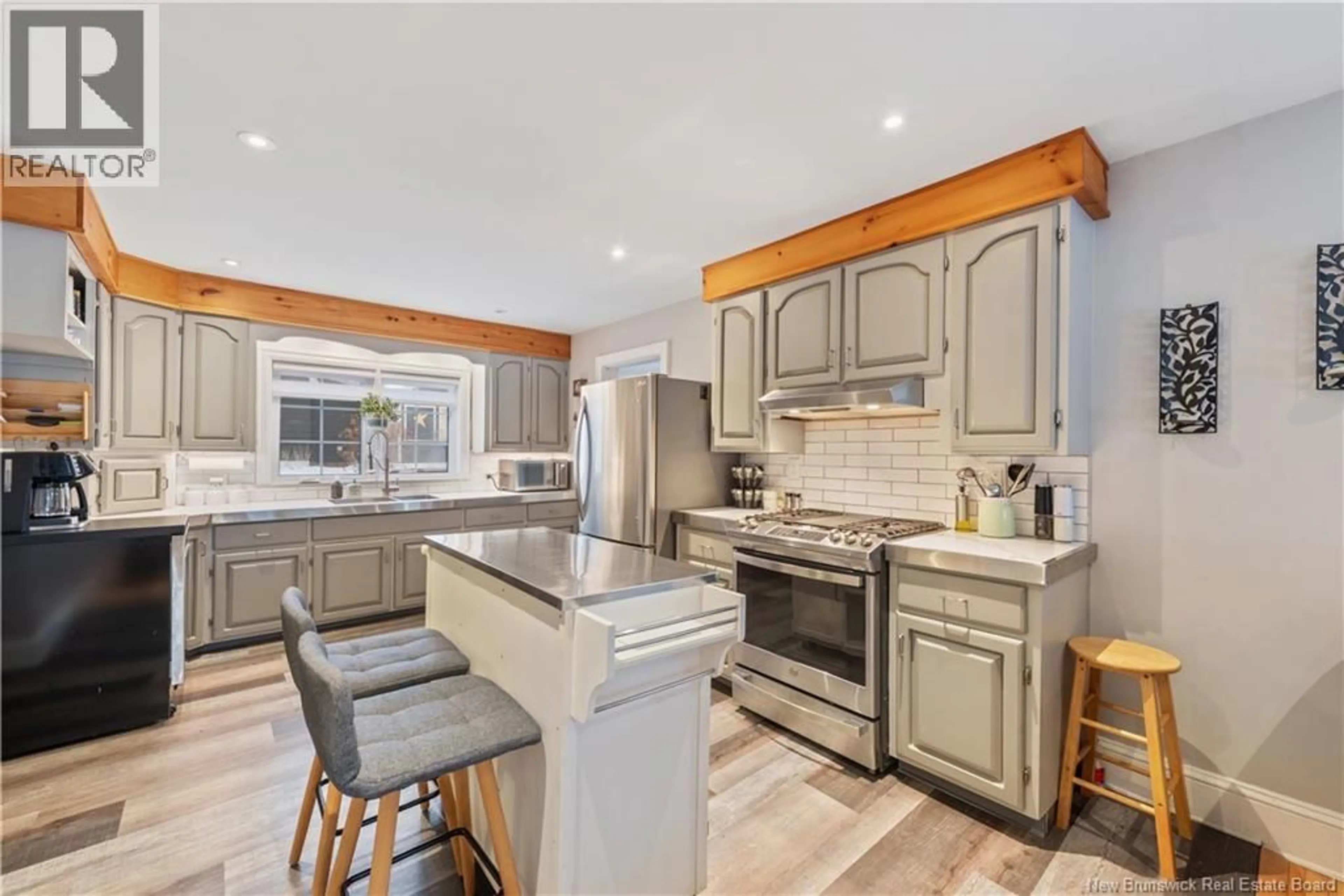 Open concept kitchen, ceramic/tile floor for 1771 RUE AMIRAULT, Dieppe New Brunswick E1A7J7