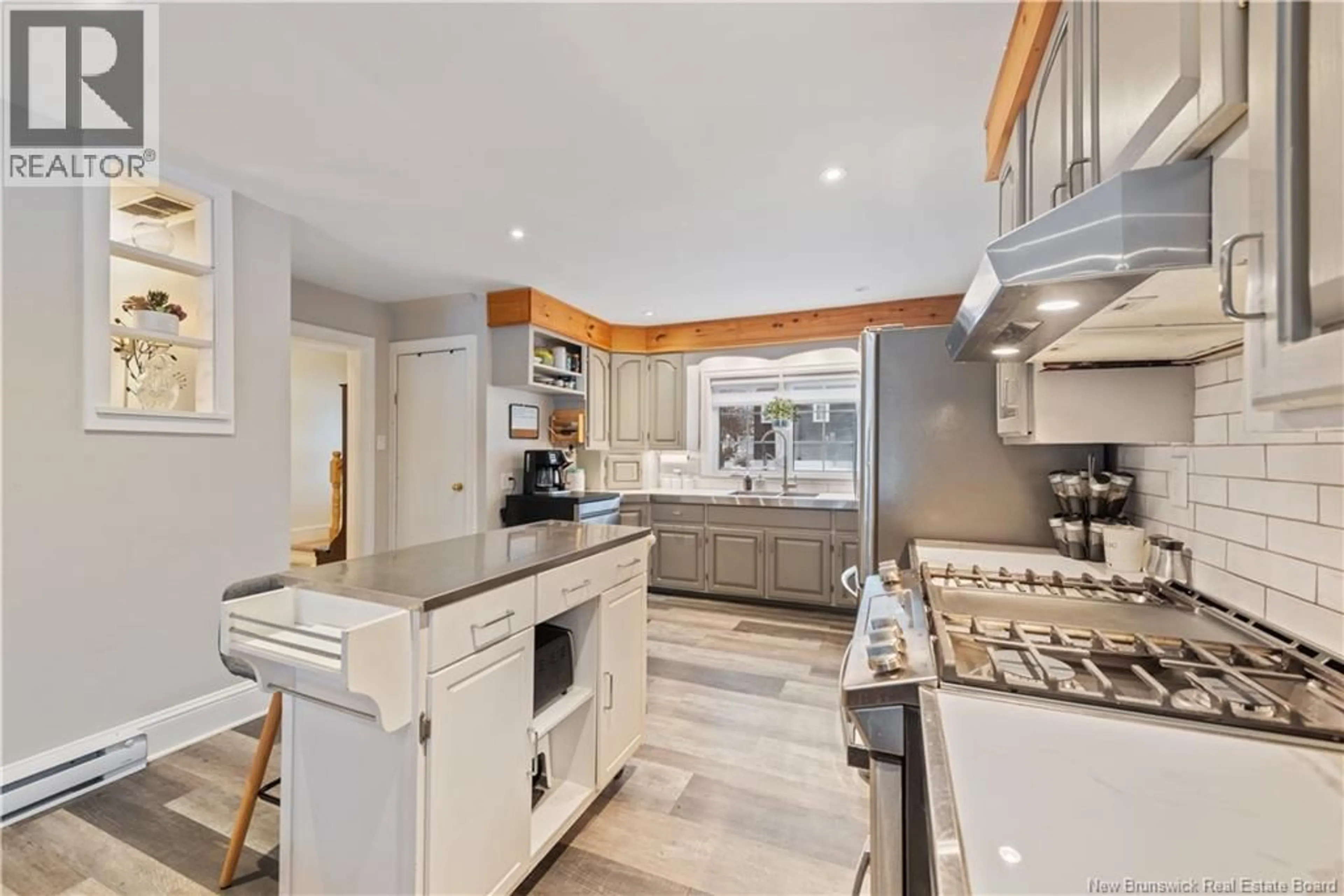 Open concept kitchen, ceramic/tile floor for 1771 RUE AMIRAULT, Dieppe New Brunswick E1A7J7