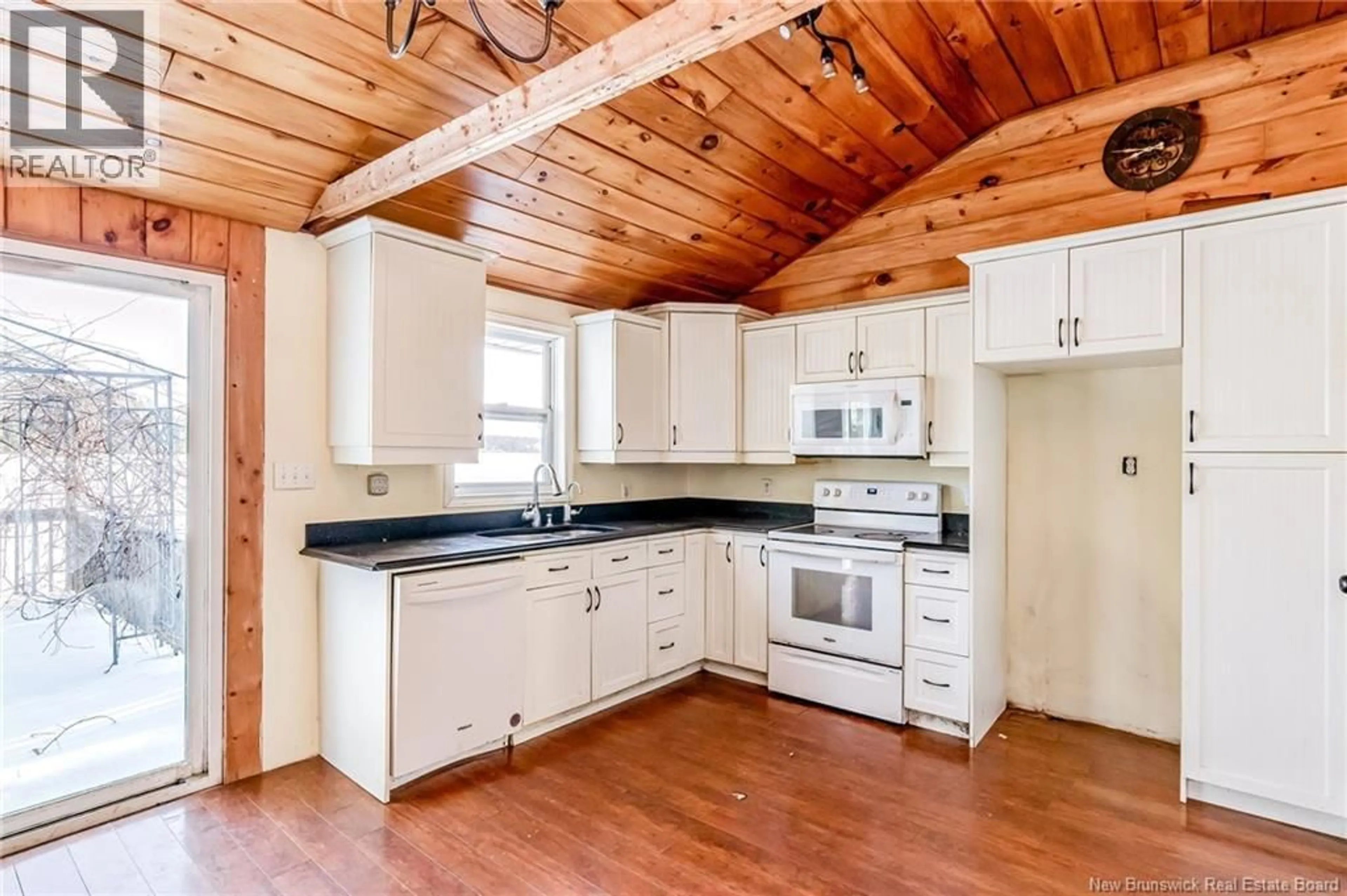 Open concept kitchen, wood/laminate floor for 72 LITTLE RIVER LANE, McKees Mills New Brunswick E4V3J7