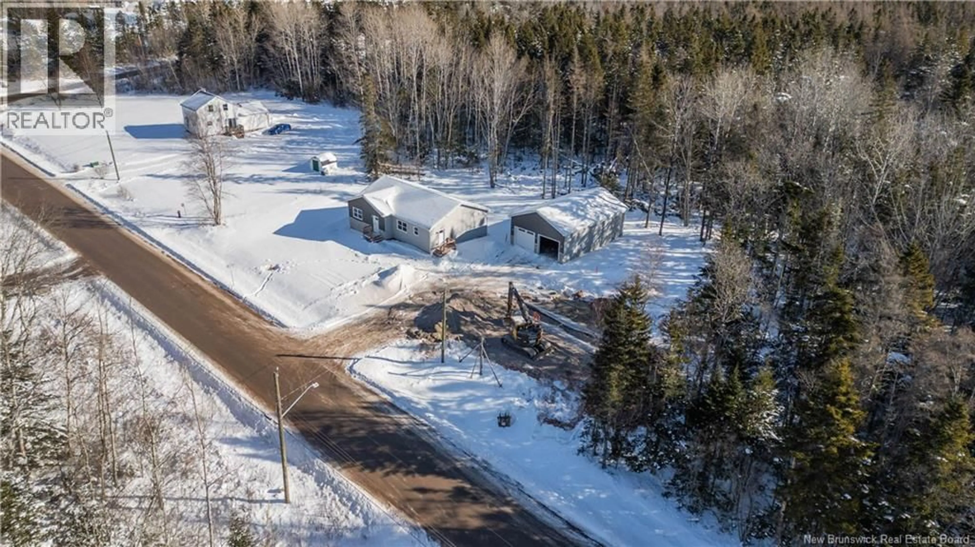 A pic from outside/outdoor area/front of a property/back of a property/a pic from drone, street for 57 CROSSMAN ROAD, Sackville New Brunswick E4L2Y3