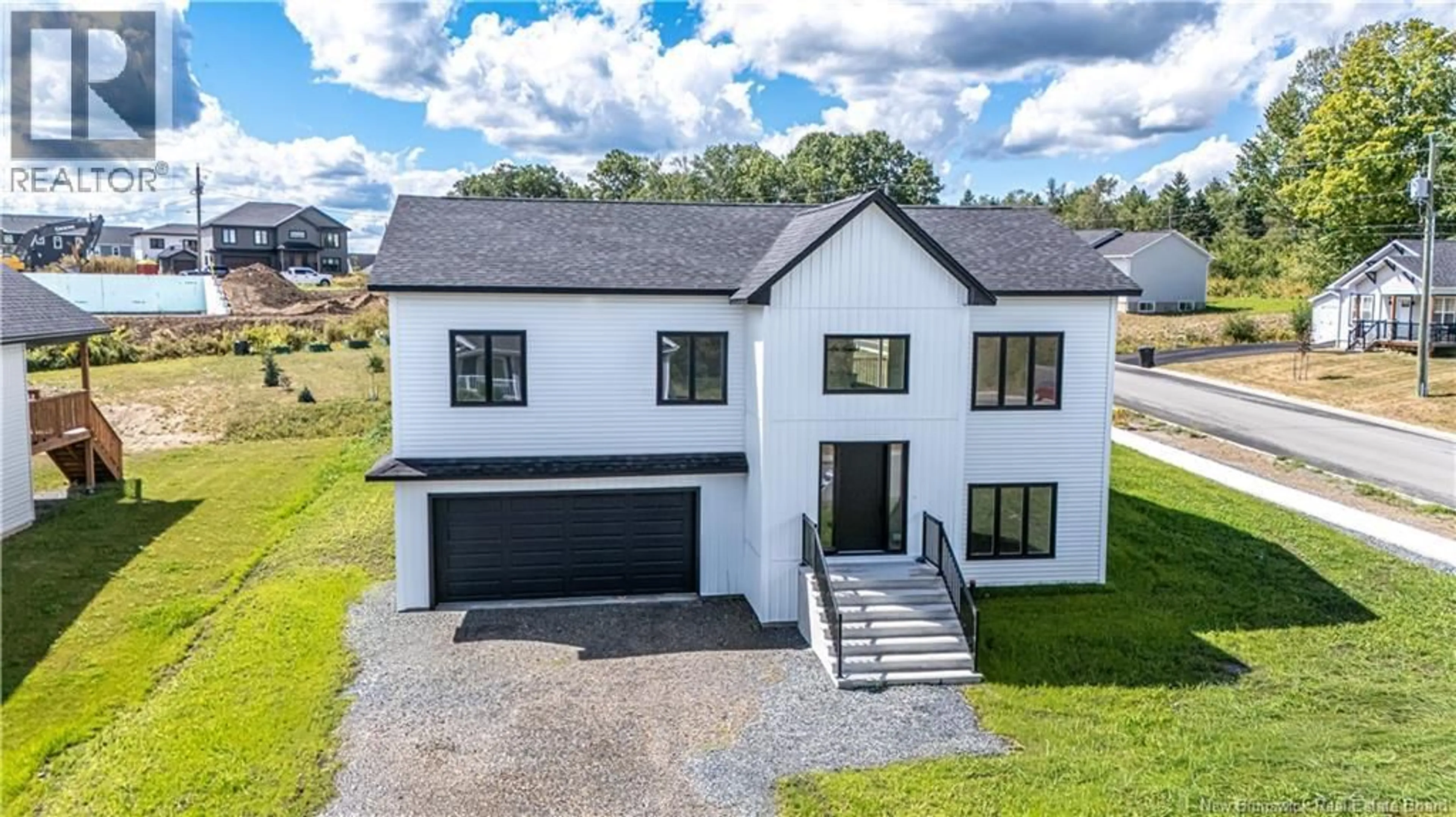 A pic from outside/outdoor area/front of a property/back of a property/a pic from drone, unknown for 141 REGIMENT CREEK AVENUE, Fredericton New Brunswick E3G0G3