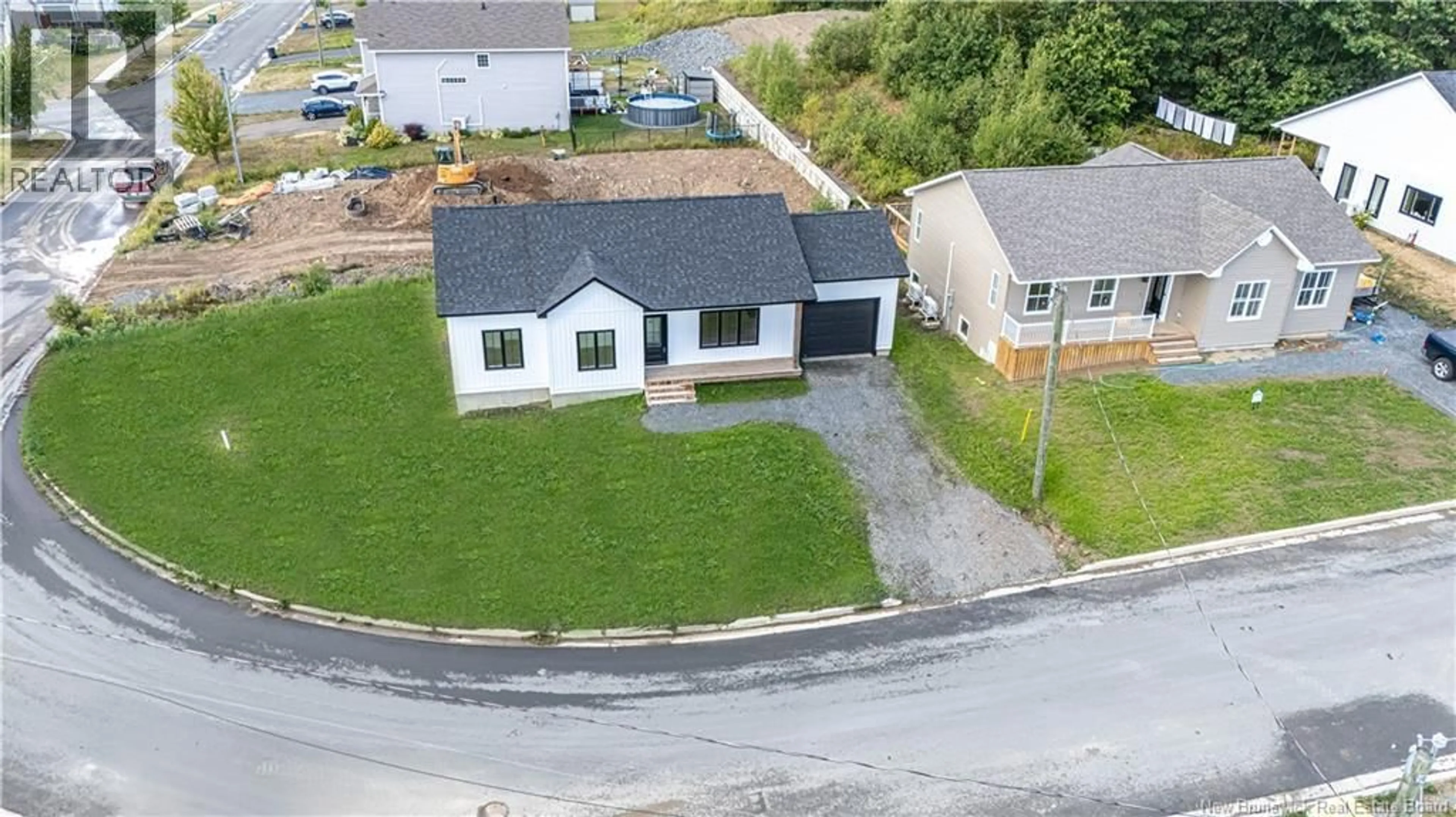 A pic from outside/outdoor area/front of a property/back of a property/a pic from drone, street for 201 GILRIDGE DRIVE, Fredericton New Brunswick E3G9W7