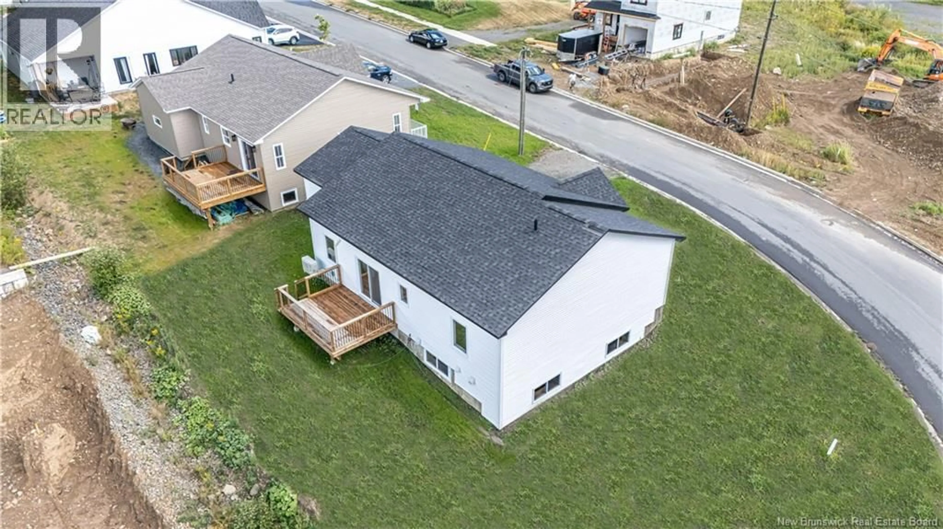 A pic from outside/outdoor area/front of a property/back of a property/a pic from drone, building for 201 GILRIDGE DRIVE, Fredericton New Brunswick E3G9W7