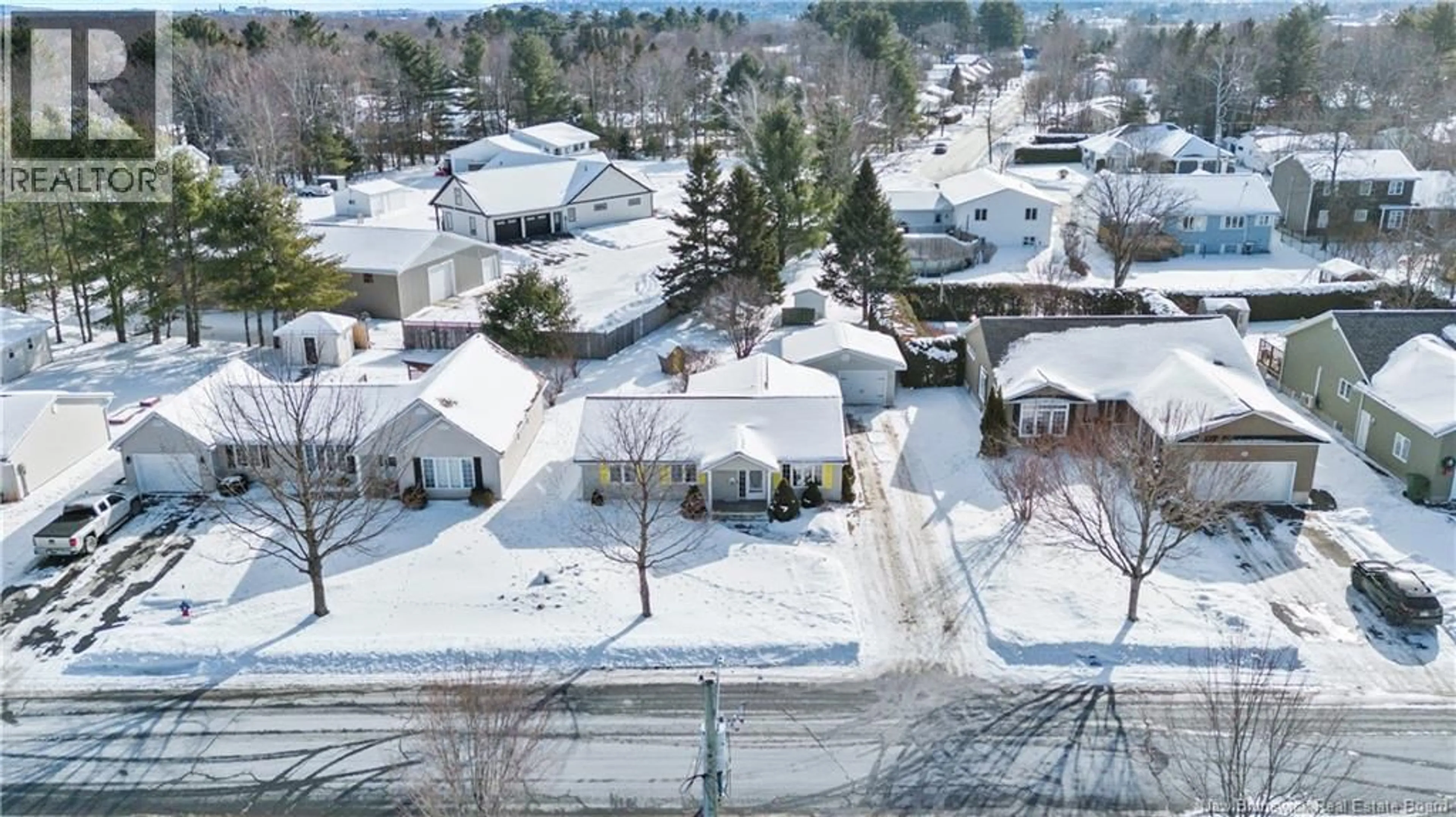 A pic from outside/outdoor area/front of a property/back of a property/a pic from drone, street for 207 MANRESA DRIVE, Fredericton New Brunswick E3A9S9