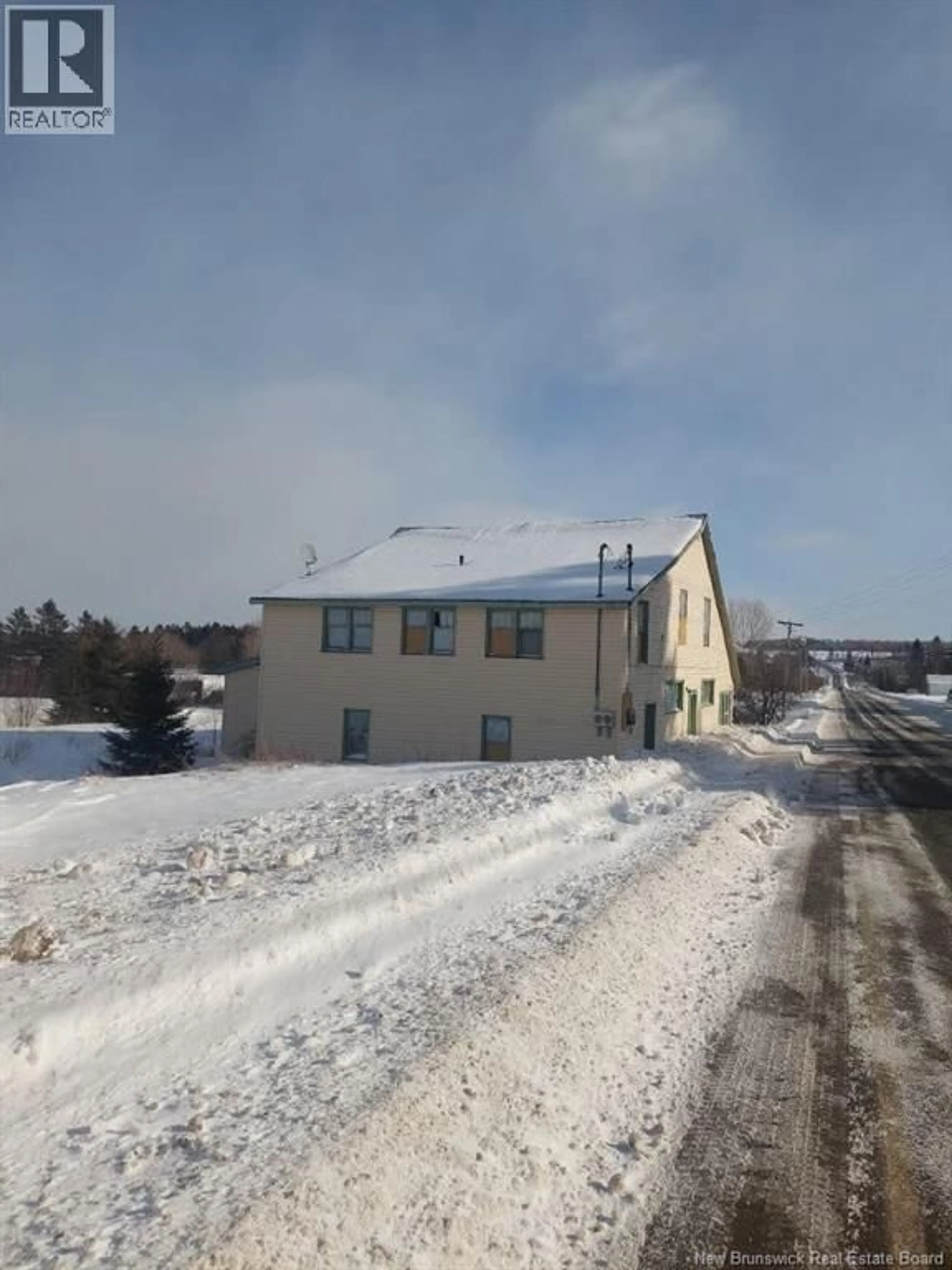 A pic from outside/outdoor area/front of a property/back of a property/a pic from drone, building for 4390 MAIN STREET, Belledune New Brunswick E8G2P6