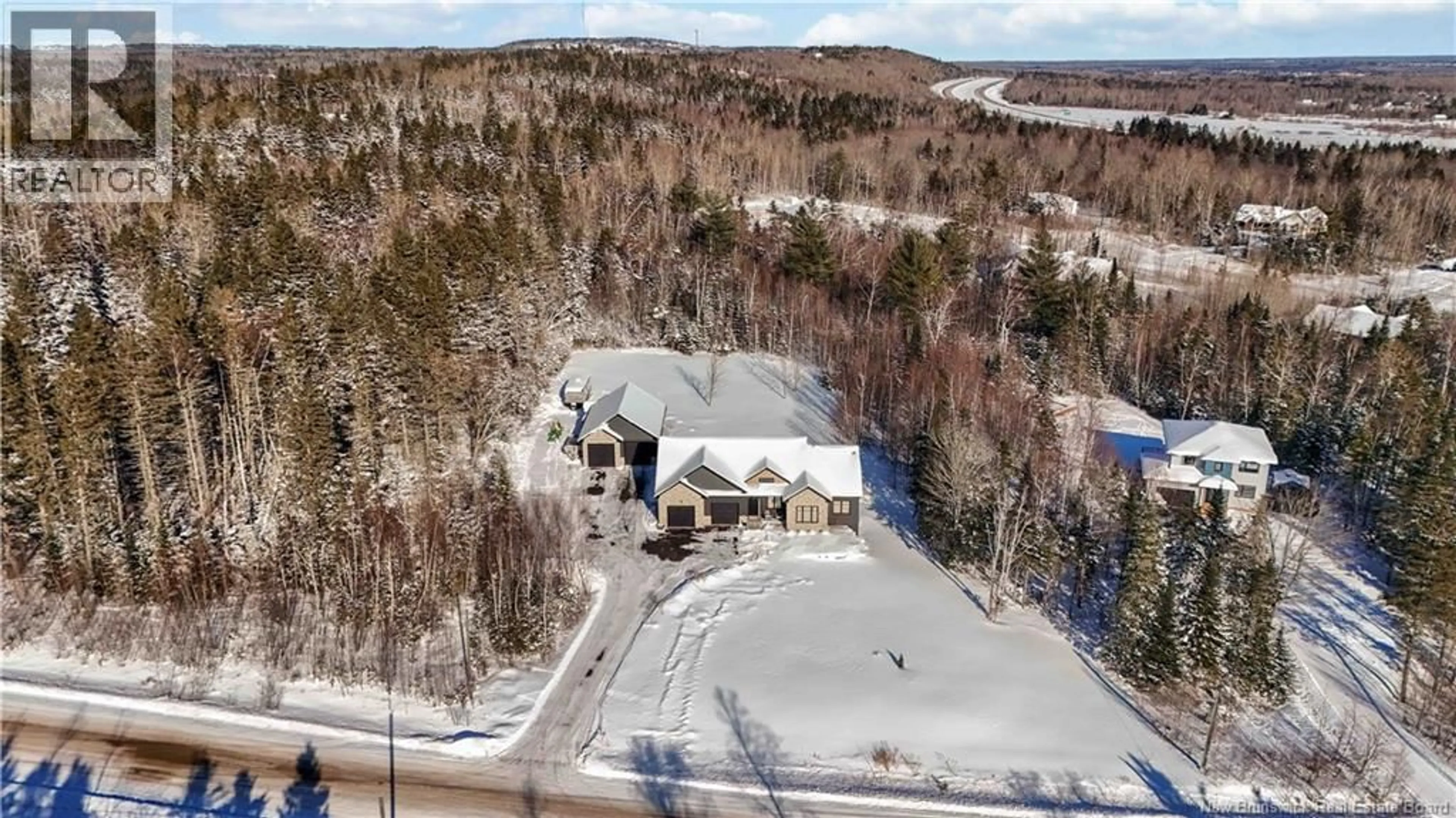 A pic from outside/outdoor area/front of a property/back of a property/a pic from drone, unknown for 19 TERRACINA DRIVE, Berry Mills New Brunswick E1G6C8