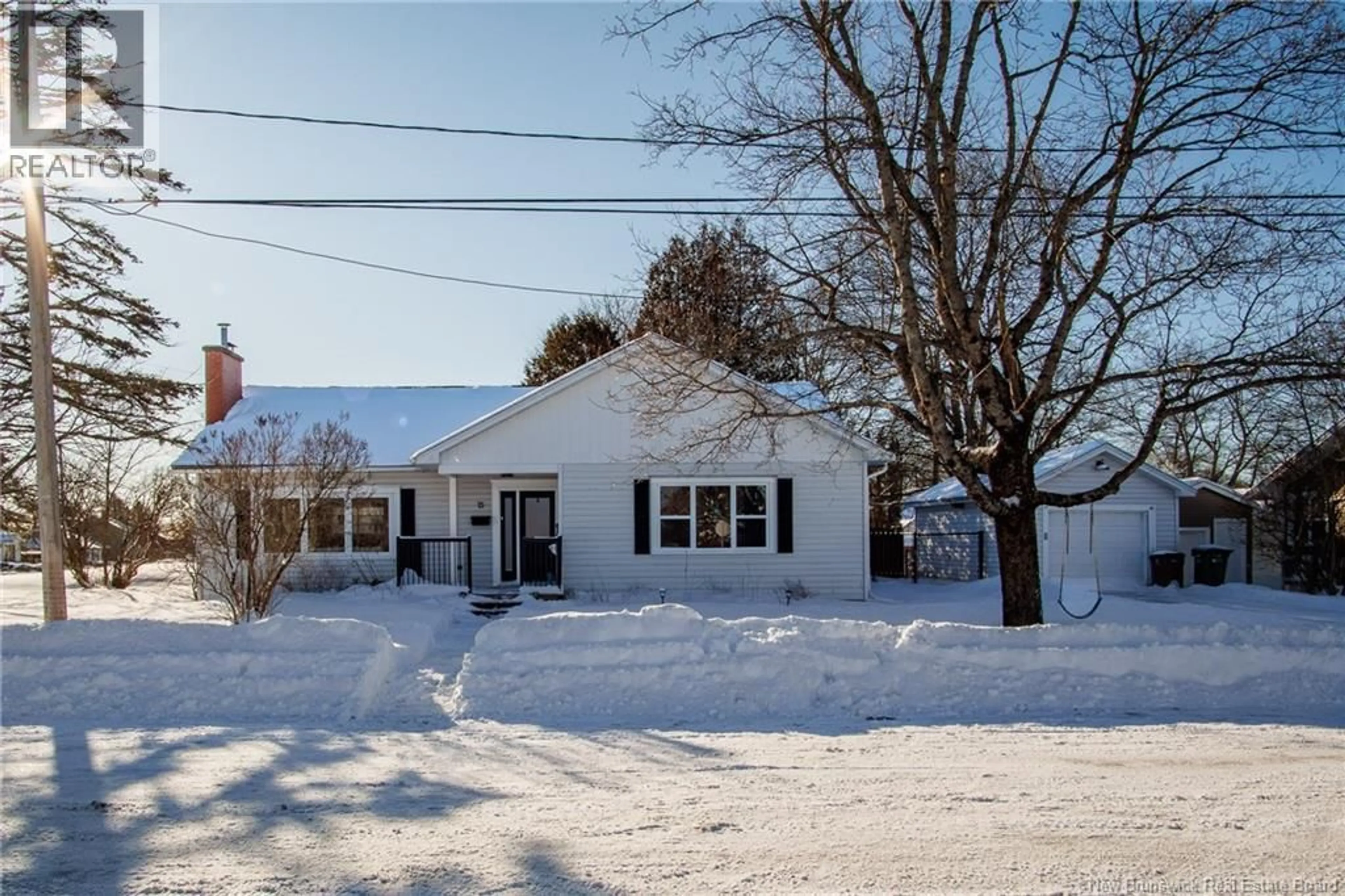 A pic from outside/outdoor area/front of a property/back of a property/a pic from drone, street for 15 FENTON DRIVE, Saint John New Brunswick E2M4E6