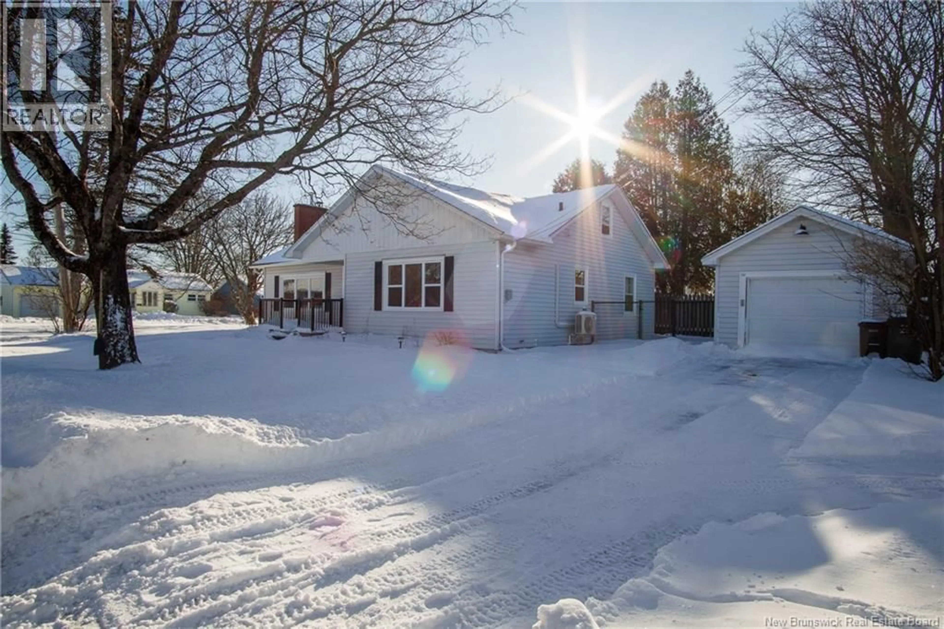 A pic from outside/outdoor area/front of a property/back of a property/a pic from drone, street for 15 FENTON DRIVE, Saint John New Brunswick E2M4E6