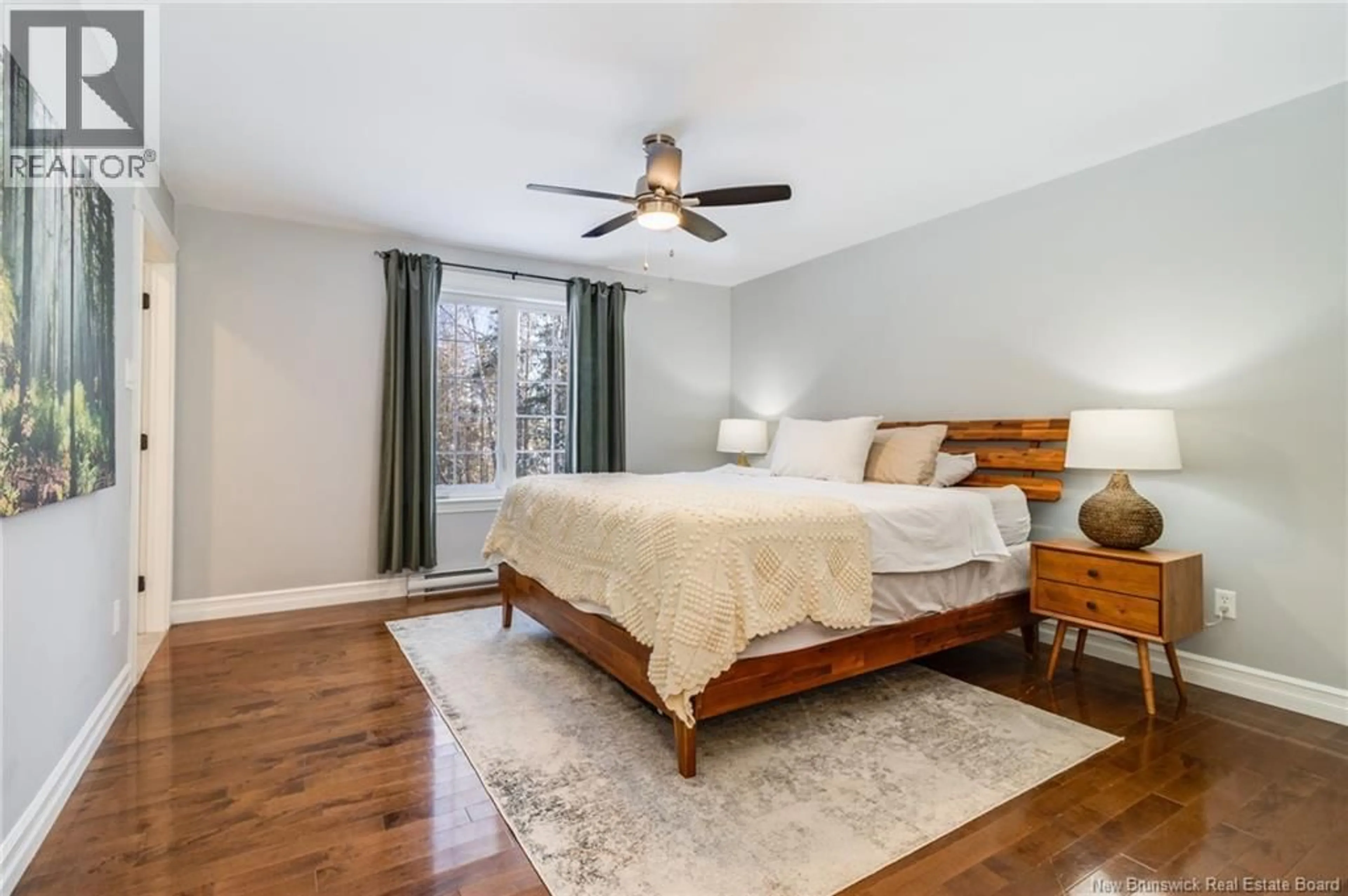 Bedroom with bed, wood/laminate floor for 140 GREEN AVENUE, Hanwell New Brunswick E3C1M6