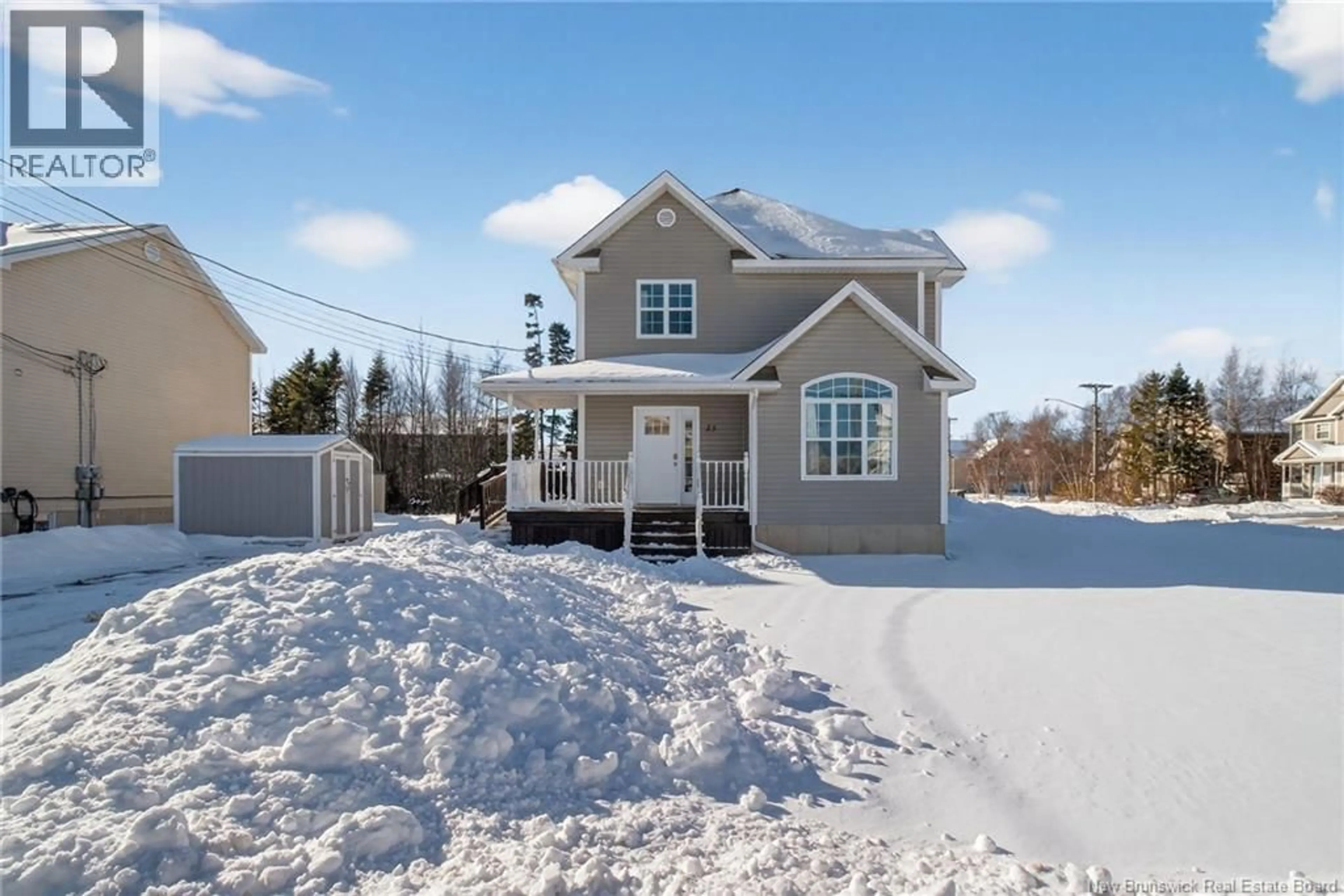 Home with vinyl exterior material, street for 23 SYRAH, Dieppe New Brunswick E1A6A7