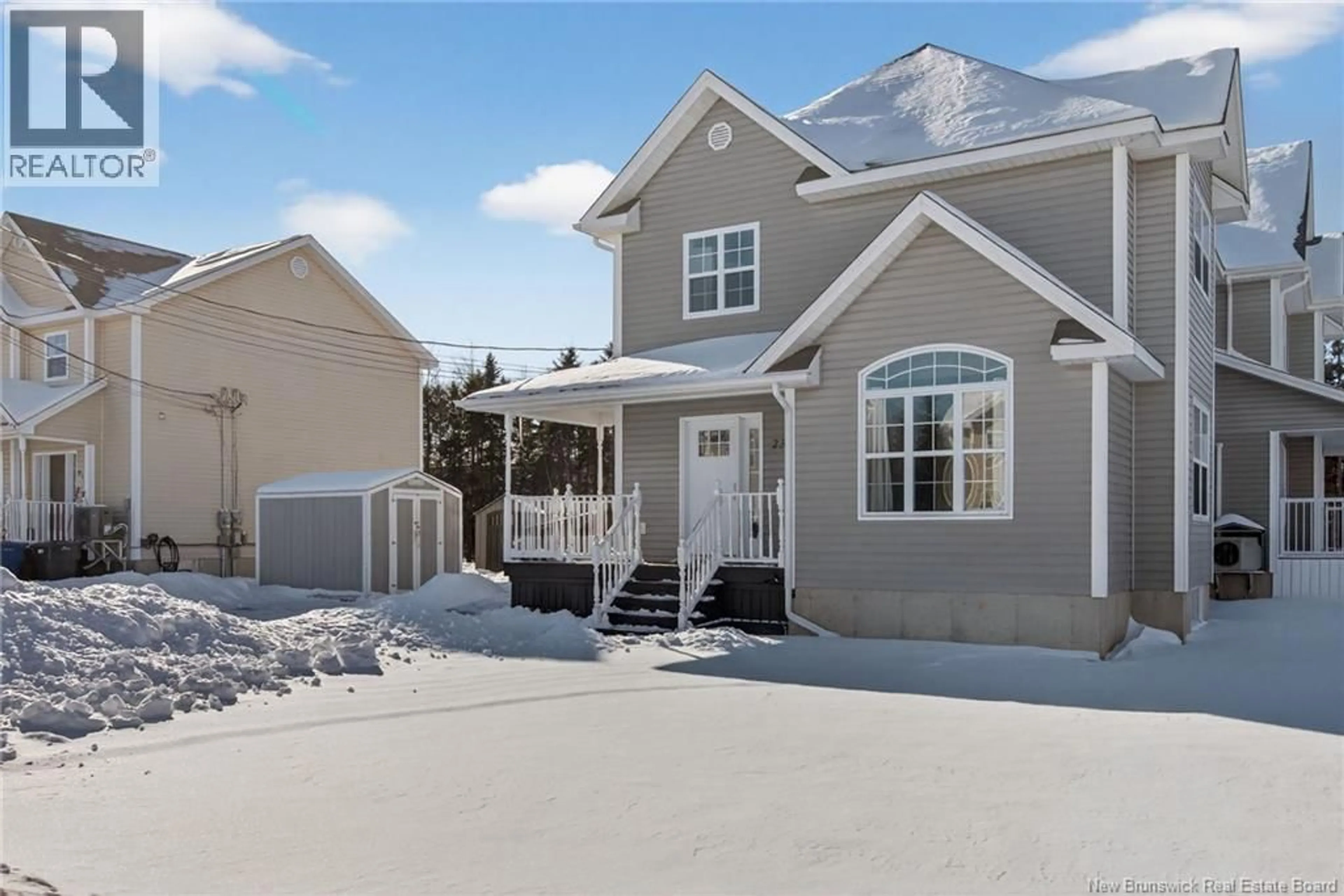 Home with vinyl exterior material, street for 23 SYRAH, Dieppe New Brunswick E1A6A7