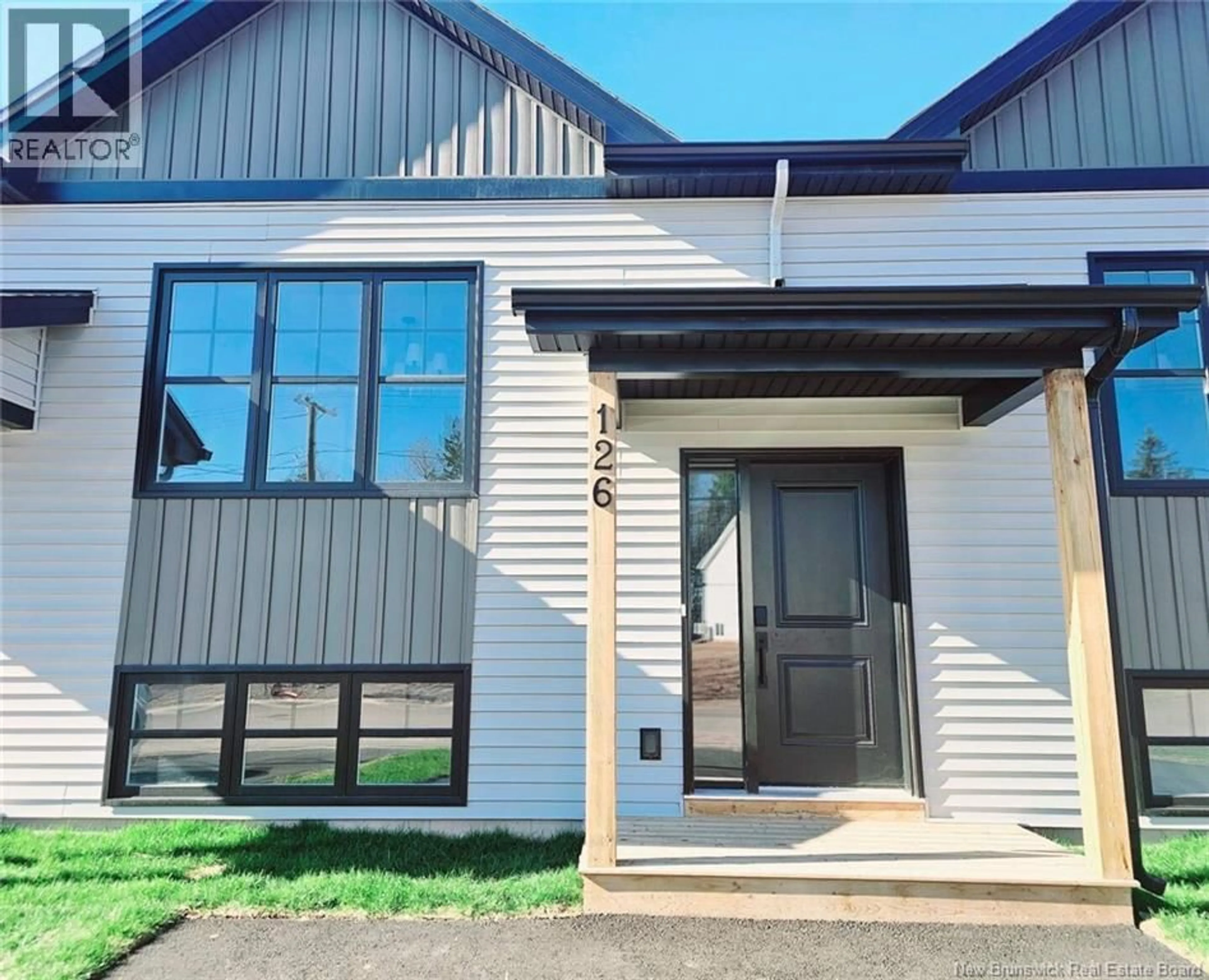 Home with vinyl exterior material, street for 126 ELSLIGER STREET, Dieppe New Brunswick E1A8P5