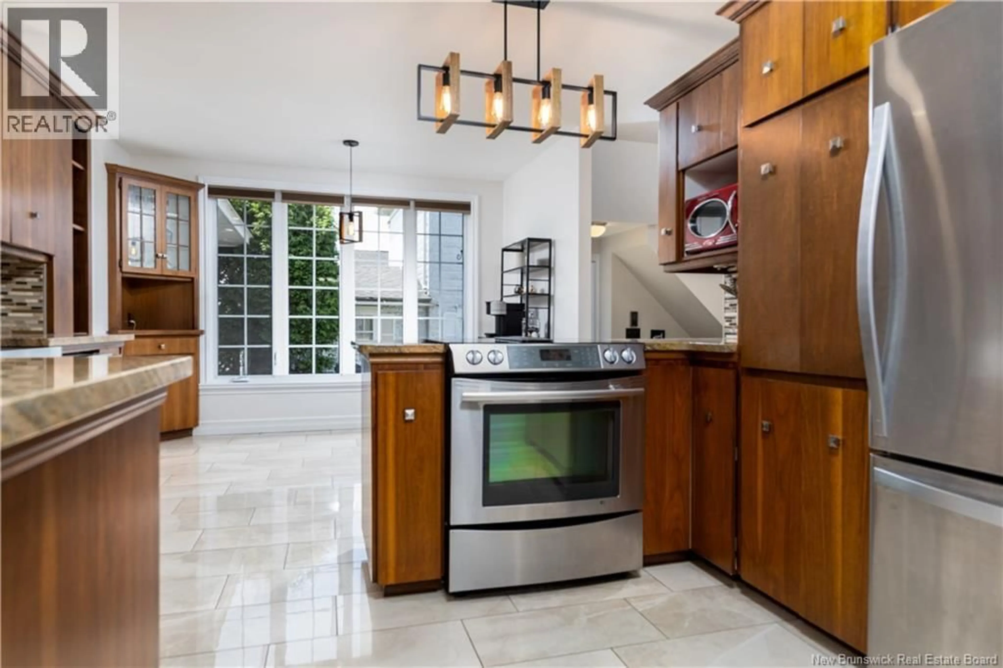 Open concept kitchen, ceramic/tile floor for 315 SHERIFF STREET, Grand-Sault/Grand Falls New Brunswick E3Z3A3