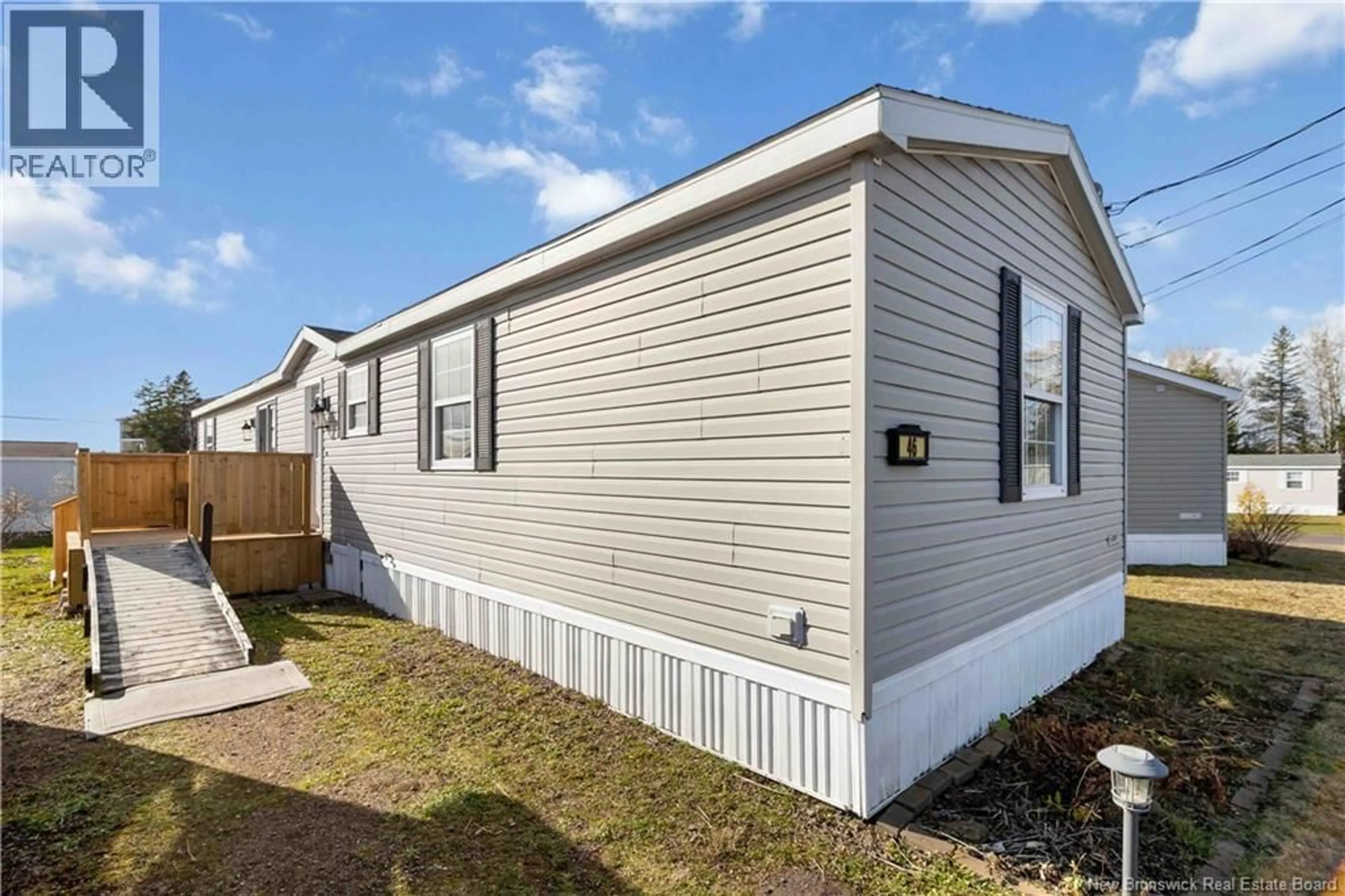 Home with vinyl exterior material, street for 46 STE MARIE LANE, Dieppe New Brunswick E1A8W4