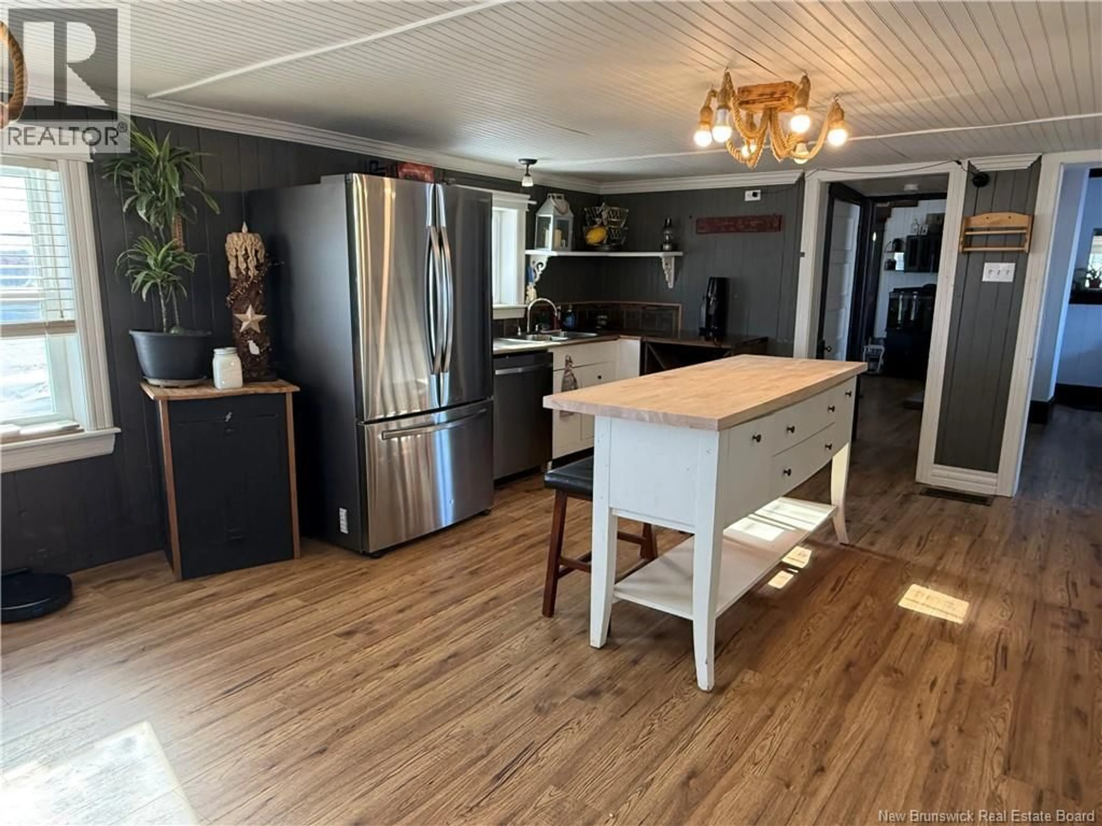 Open concept kitchen, wood/laminate floor for 450 CH DE L'EGLISE, Saint-André New Brunswick E3Y2Y8