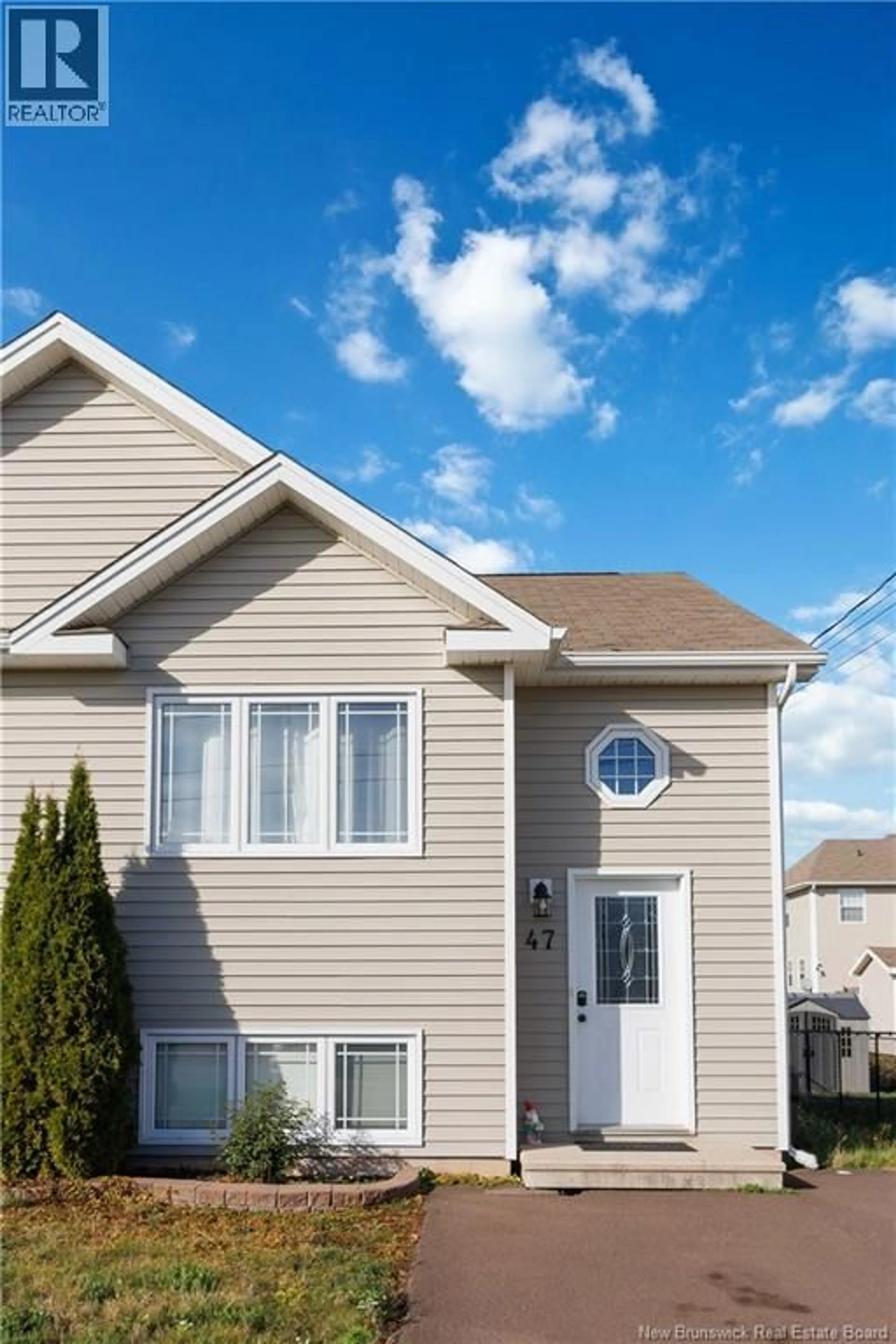 Home with vinyl exterior material, street for 47 NUGENT, Dieppe New Brunswick E1A0S7