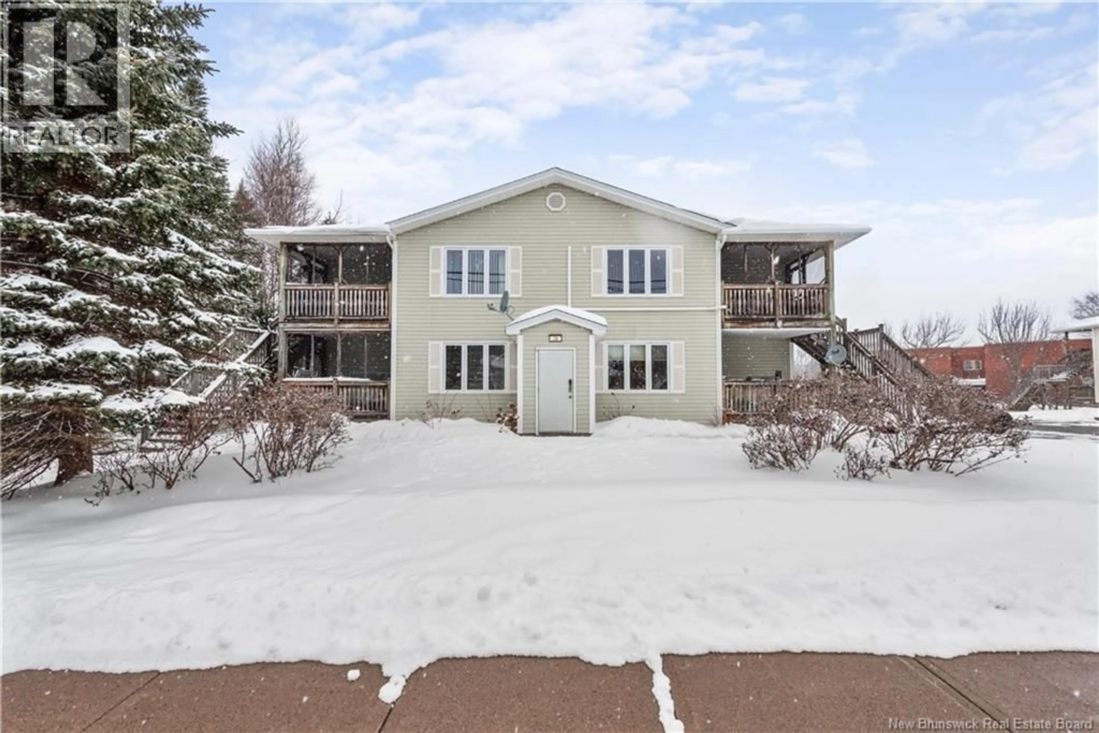 A pic from outside/outdoor area/front of a property/back of a property/a pic from drone, unknown for 8 - 20 DAMIEN STREET, Dieppe New Brunswick E1A7S9