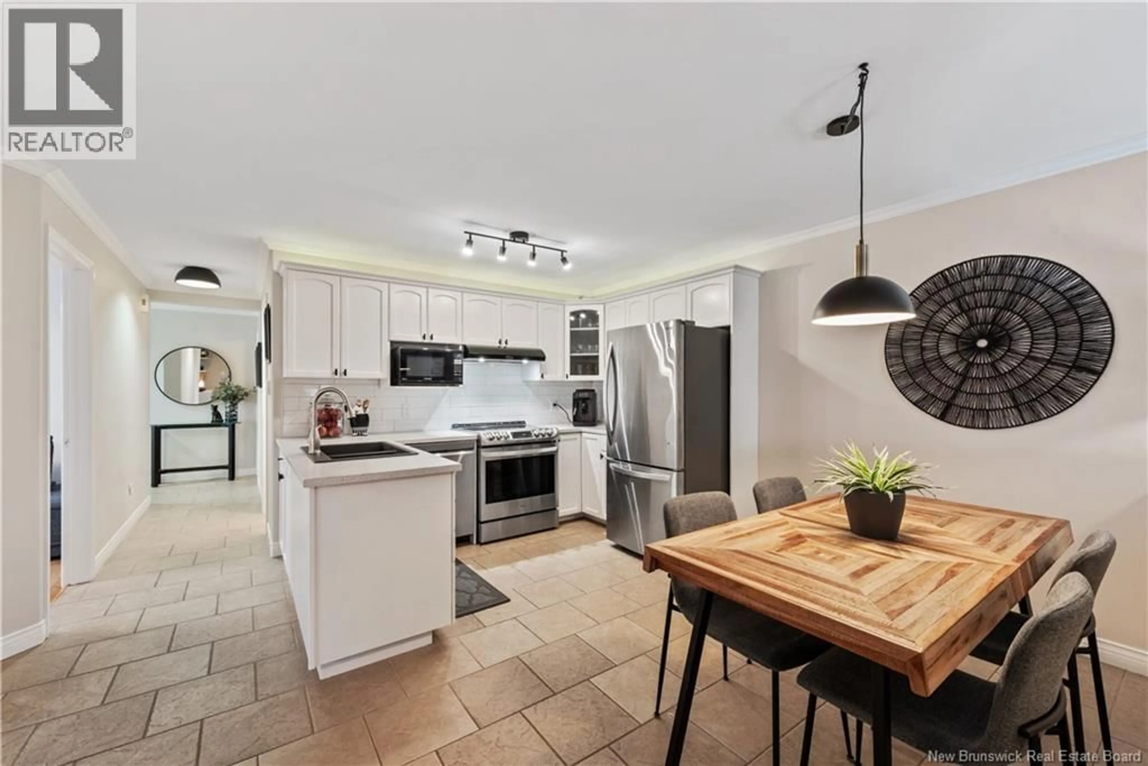 Open concept kitchen, ceramic/tile floor for 8 - 20 DAMIEN STREET, Dieppe New Brunswick E1A7S9