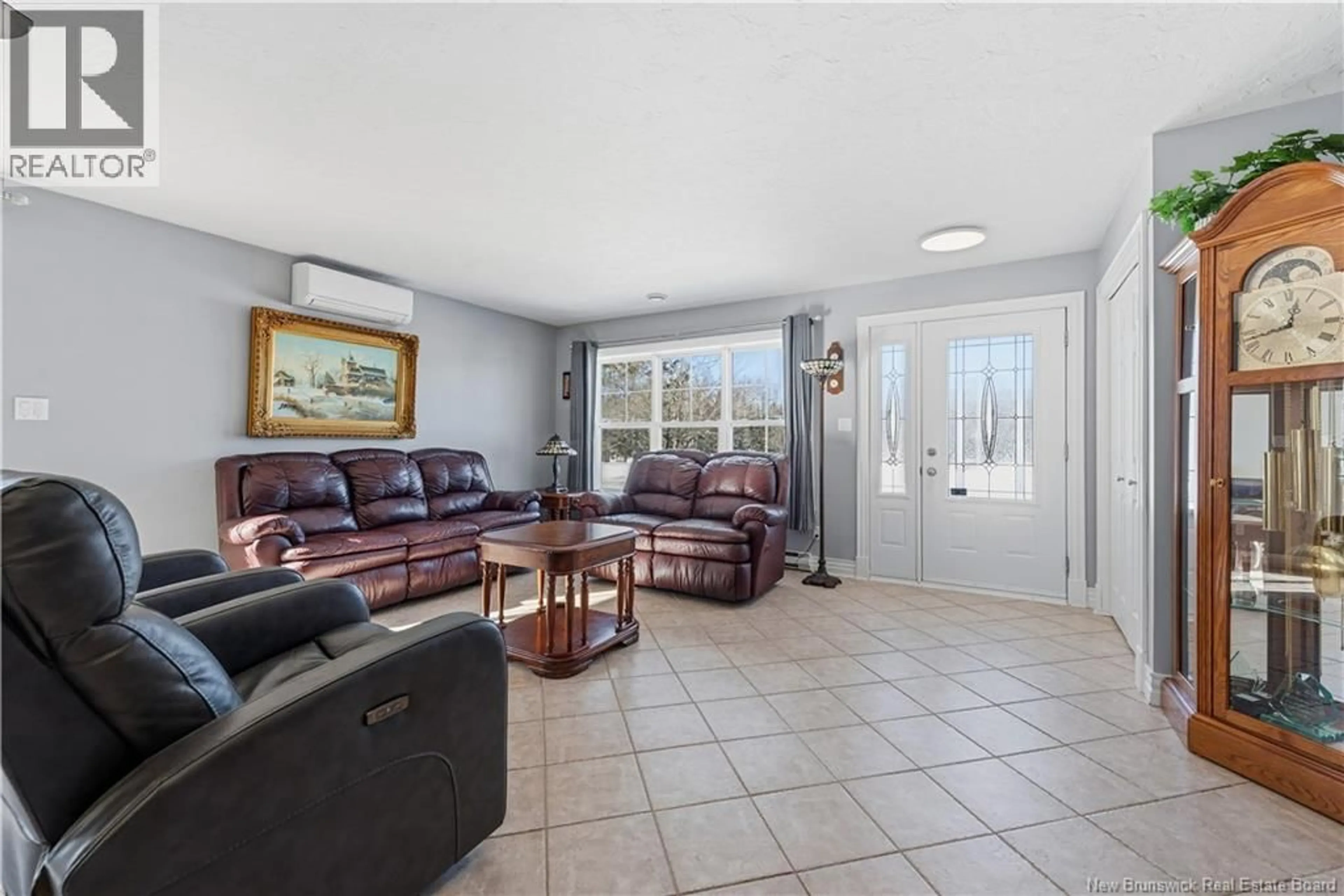 Living room with furniture, ceramic/tile floor for 65 CLEMENT AVENUE, Saint-Antoine New Brunswick E4V1E3