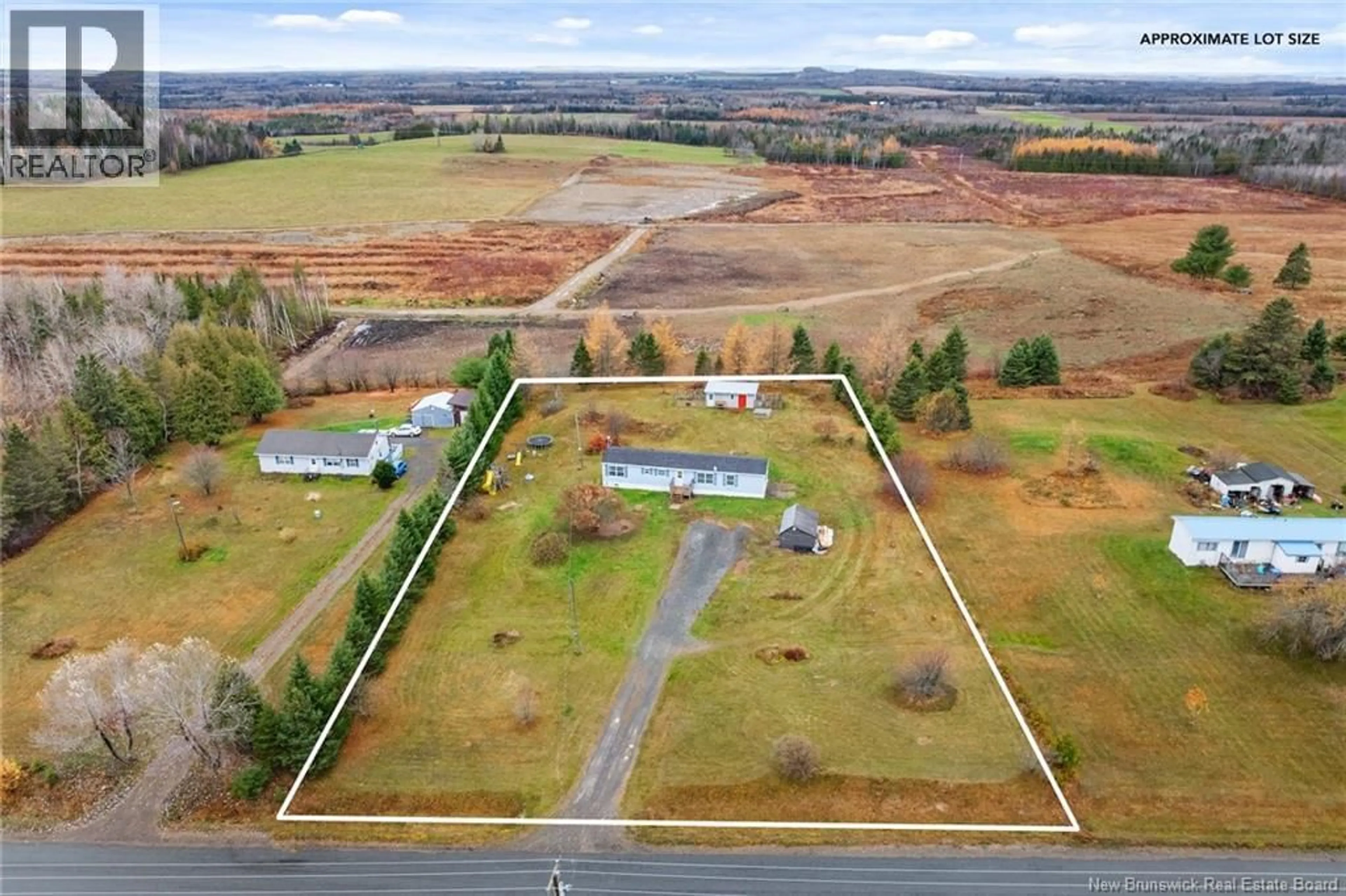 A pic from outside/outdoor area/front of a property/back of a property/a pic from drone, water/lake/river/ocean view for 257 WILMOT ROAD, Wilmot New Brunswick E7P2V8