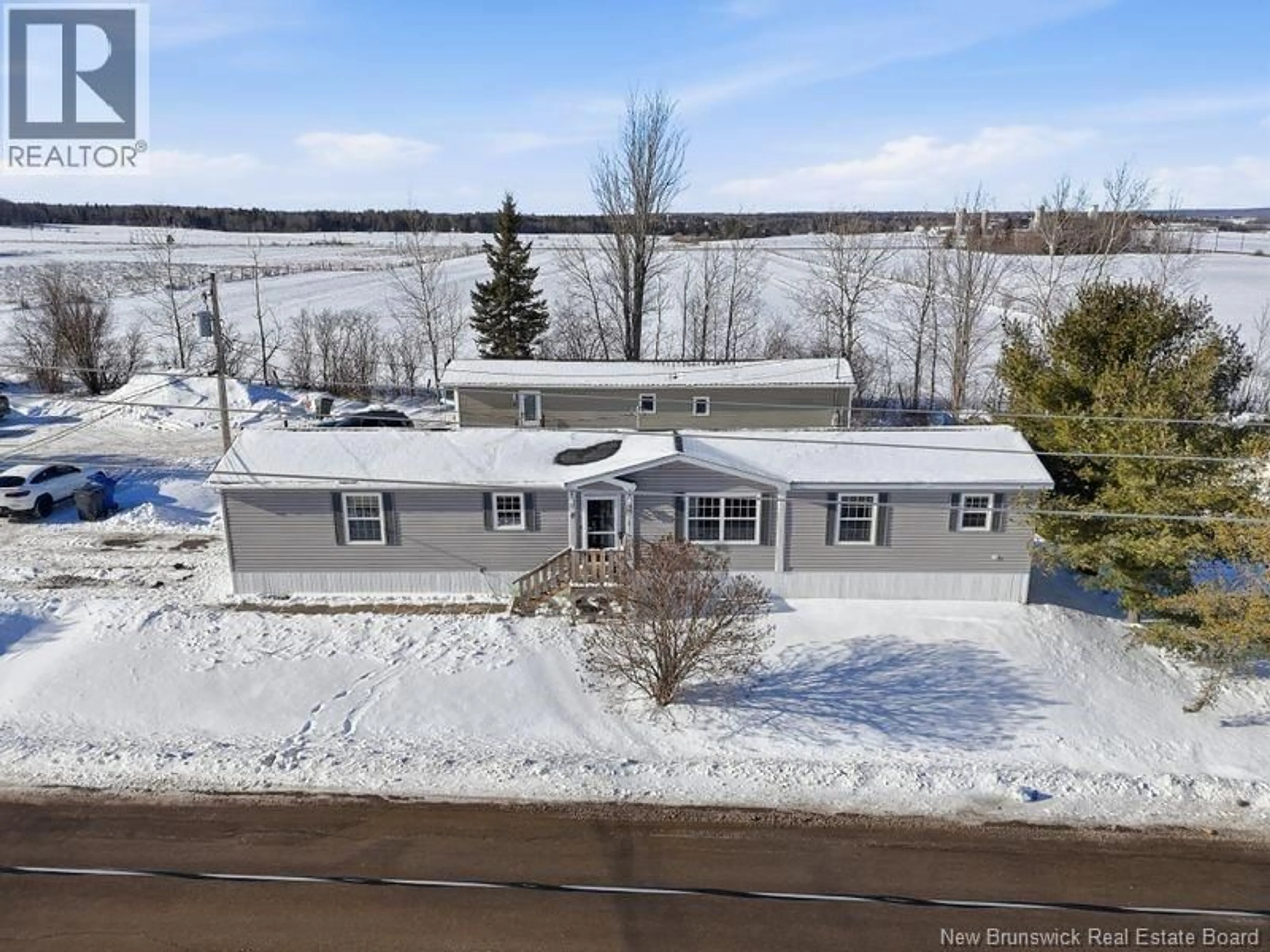 A pic from outside/outdoor area/front of a property/back of a property/a pic from drone, water/lake/river/ocean view for 15 RIVER EAST DRIVE, Riverview New Brunswick E1B5B1