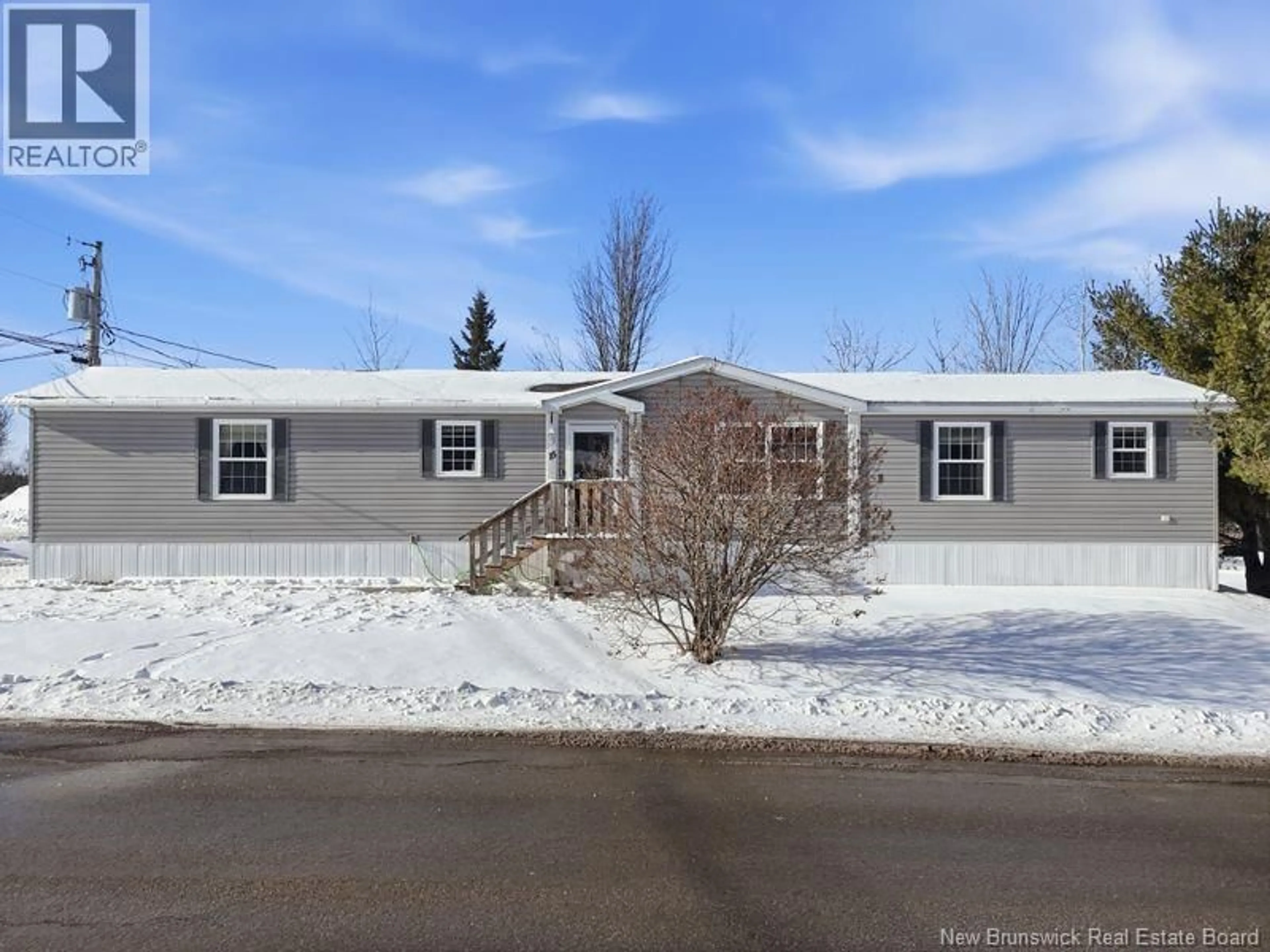Home with vinyl exterior material, street for 15 RIVER EAST DRIVE, Riverview New Brunswick E1B5B1