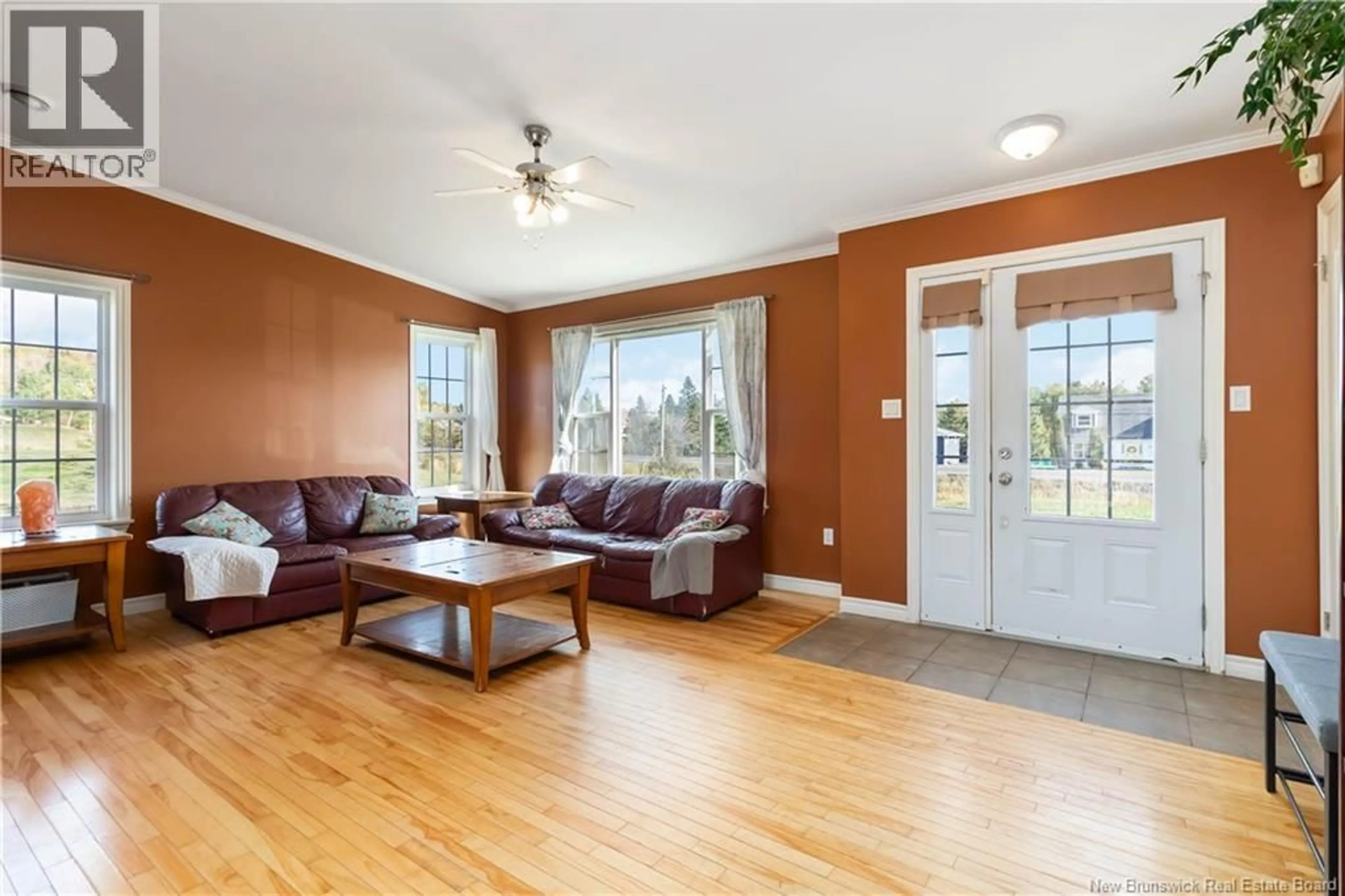 Living room with furniture, wood/laminate floor for 2282 ROUTE 490, Ammon New Brunswick E1G3P4