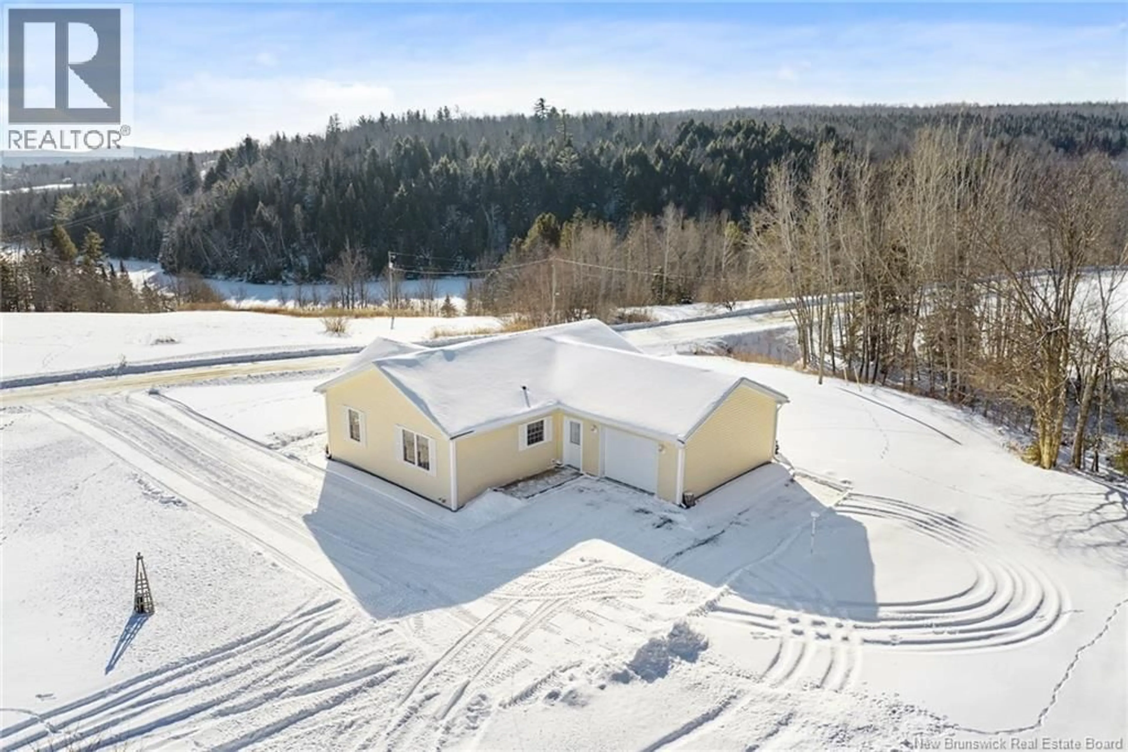 A pic from outside/outdoor area/front of a property/back of a property/a pic from drone, building for 115 MORRISON RD, Rossville New Brunswick E6G2N4