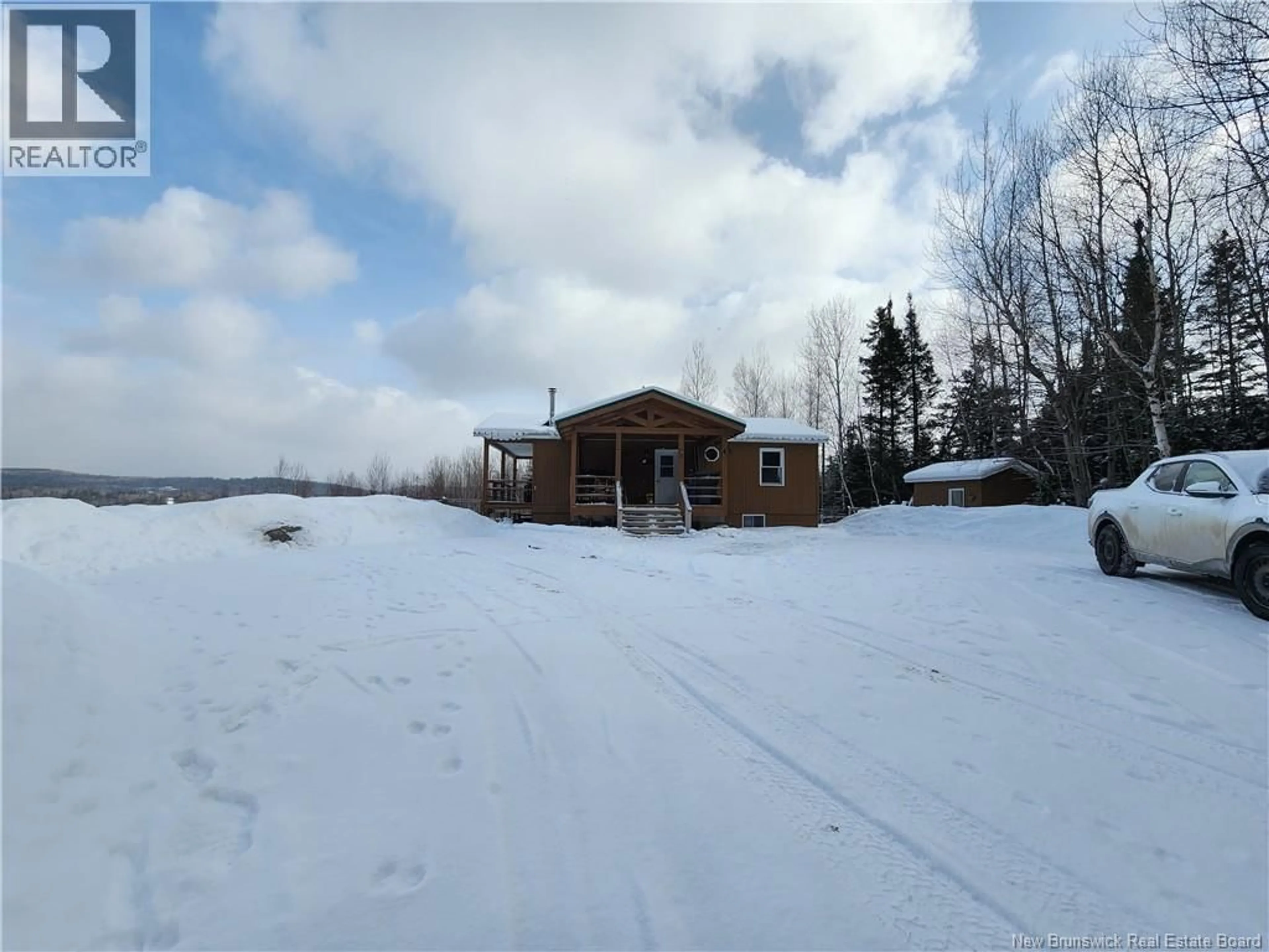 A pic from outside/outdoor area/front of a property/back of a property/a pic from drone, water/lake/river/ocean view for 25 CURRY BROOK LODGE LANE, Aroostook Junction New Brunswick E7H1T9