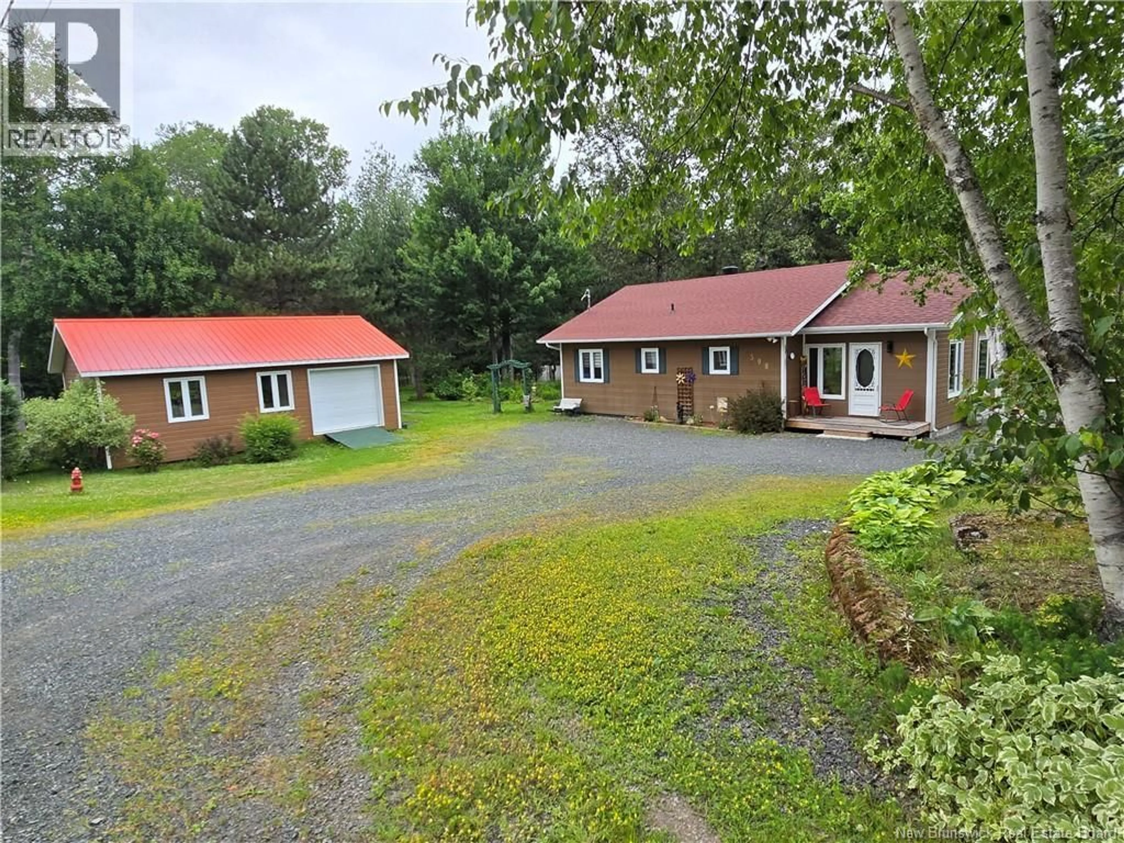 A pic from outside/outdoor area/front of a property/back of a property/a pic from drone, street for 398 LINDA STREET, Beresford New Brunswick E8K2C9