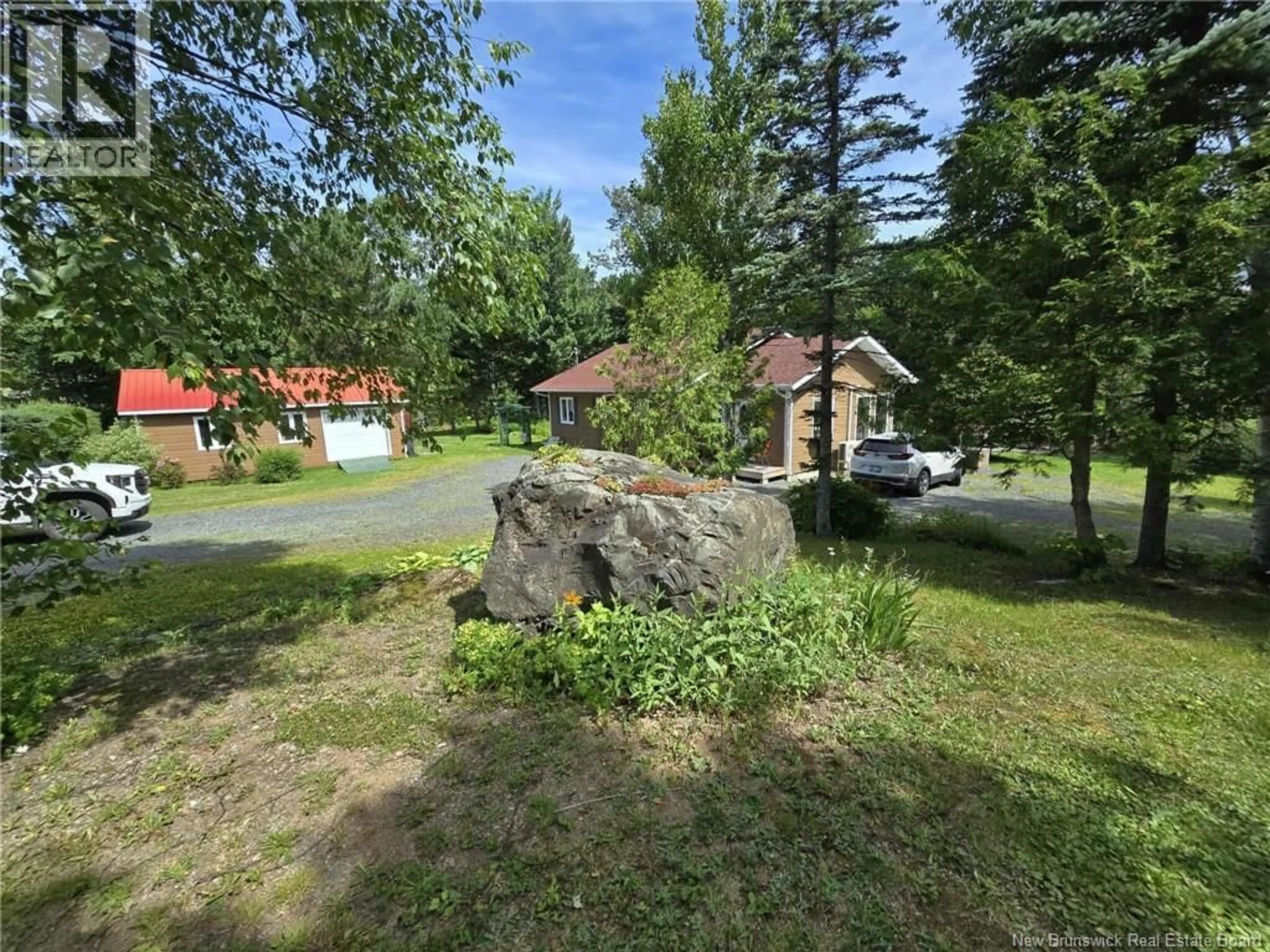 A pic from outside/outdoor area/front of a property/back of a property/a pic from drone, unknown for 398 LINDA STREET, Beresford New Brunswick E8K2C9