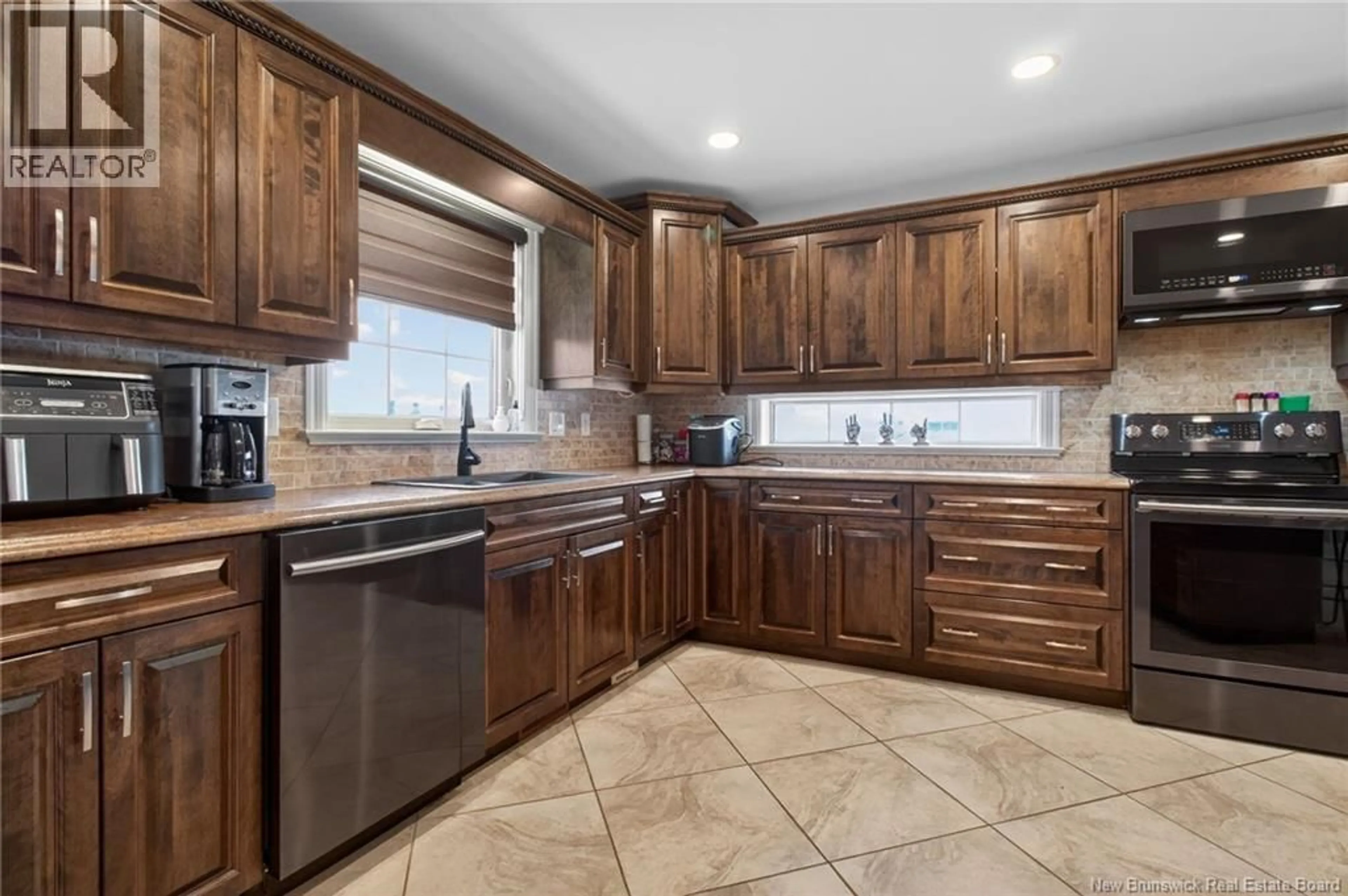 Open concept kitchen, ceramic/tile floor for 124 LAROCHELLE STREET, Dieppe New Brunswick E1A8Y5