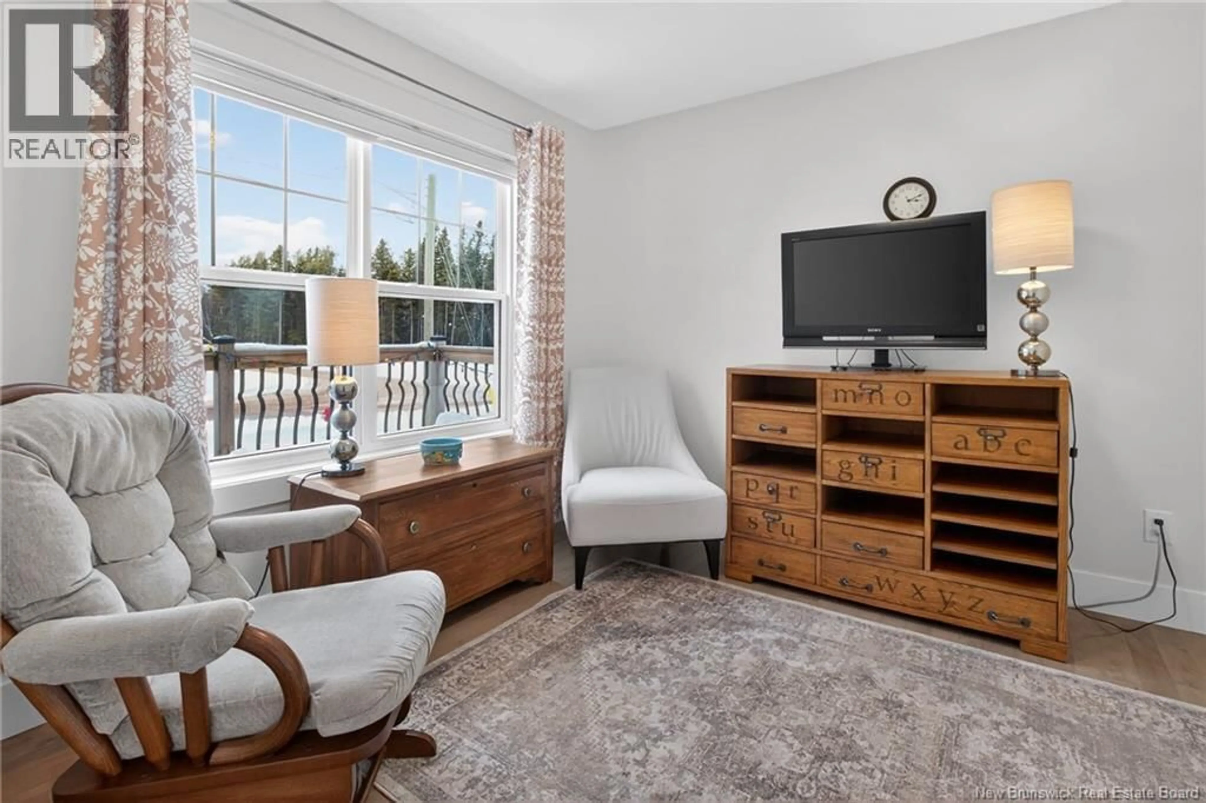 Living room with furniture, unknown for 410 GLENGROVE ROAD, Moncton New Brunswick E1A8C8