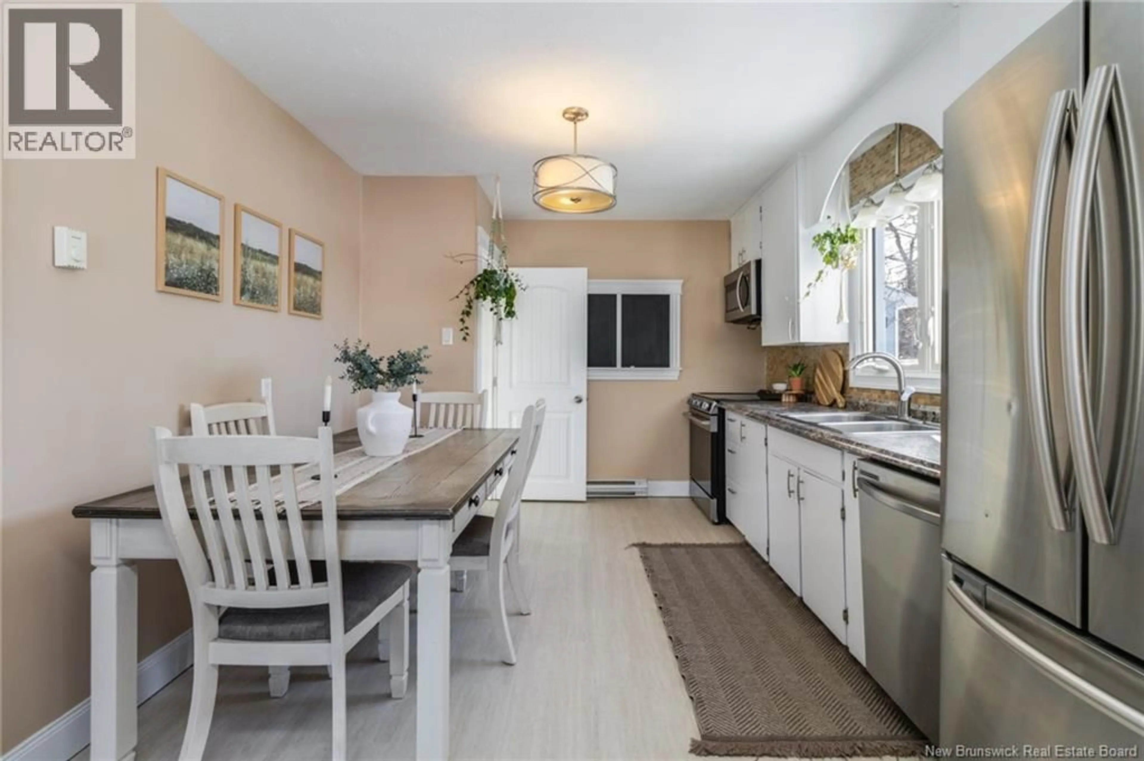Open concept kitchen, ceramic/tile floor for 403 GARDINER STREET, Oromocto New Brunswick E2V1G4