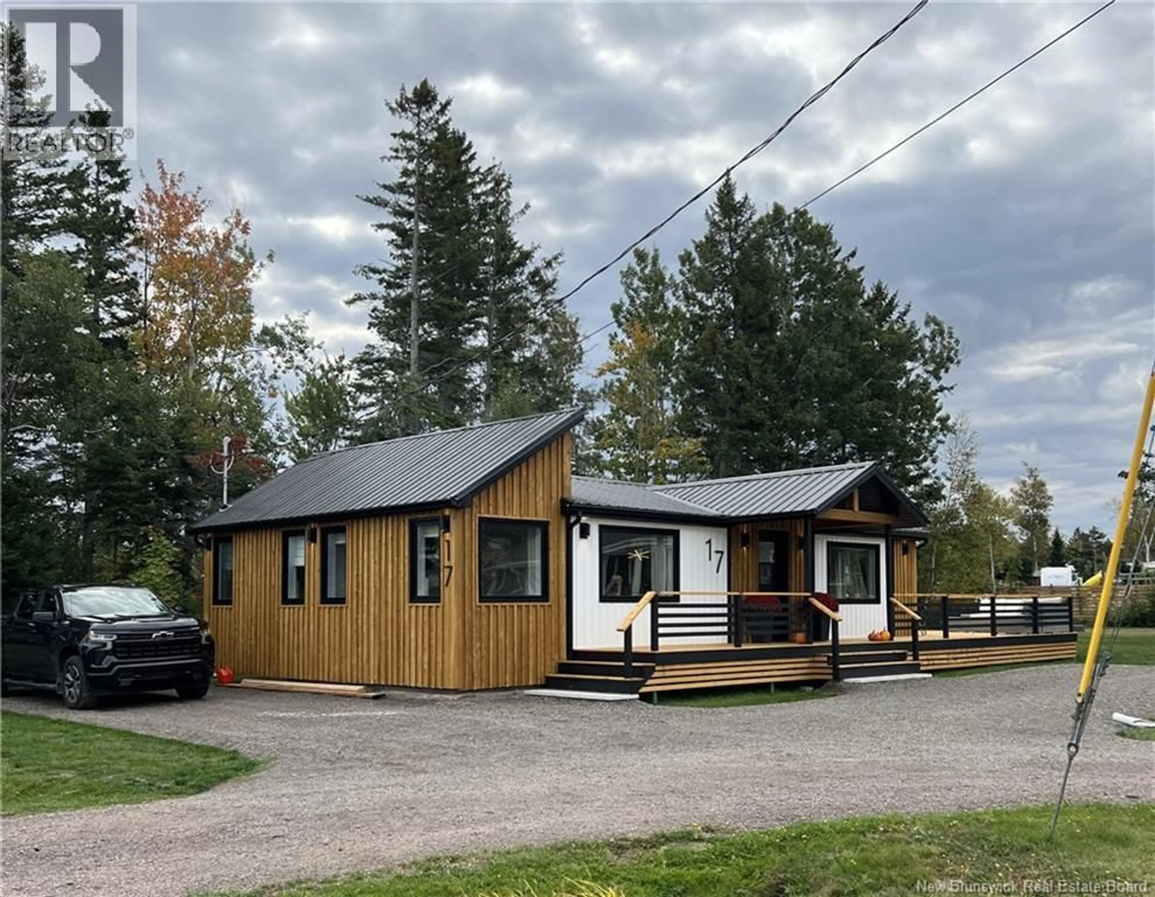 Home with vinyl exterior material, street for 17 SANDPIPER PLACE, Grande-Digue New Brunswick E4R5X8