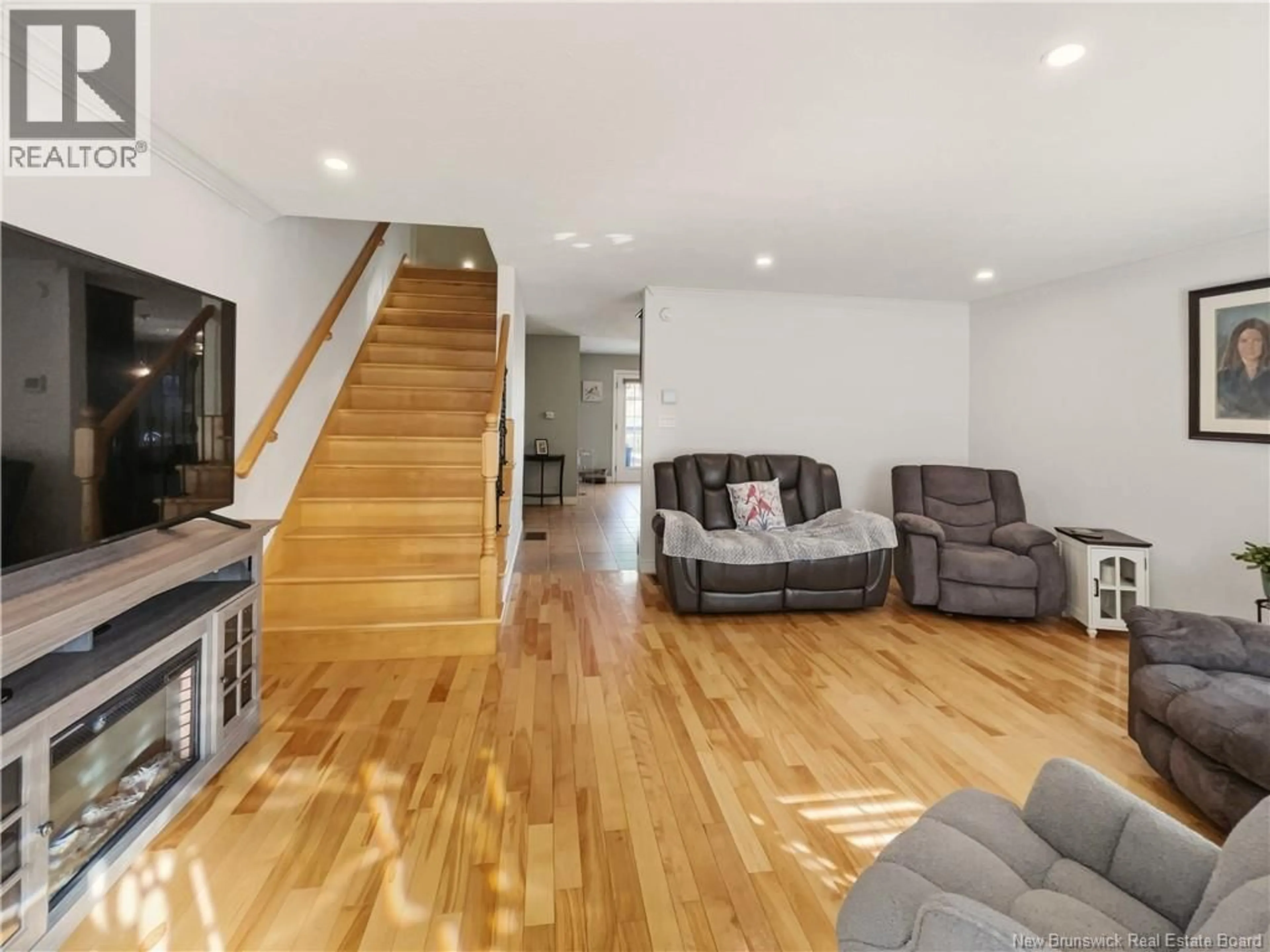 Living room with furniture, wood/laminate floor for 9 BERRY STREET, Moncton New Brunswick E1A6G3